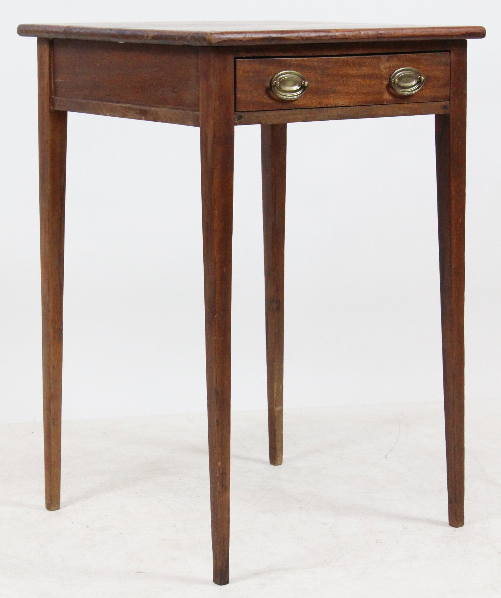 Hepplewhite 1 Drawer Stand: Hepplewhite taper leg one drawer stand. Cherry legs, mahogany top and drawer. Two small oval brasses. Red washed finish. 30" h, 20" square top.