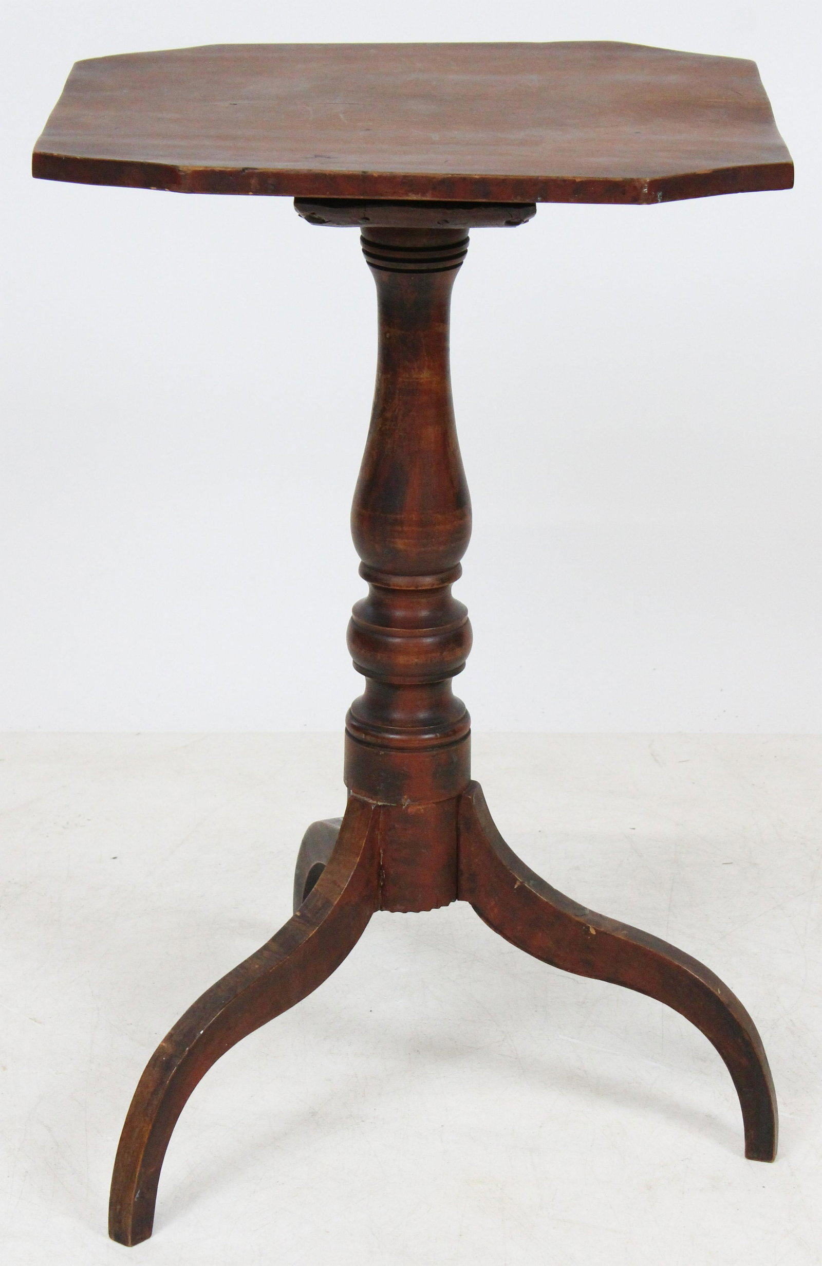 Federal Coffin Top Candle Stand: A Ca. 1800 New England Federal coffin top spider leg candle stand. Birch & maple, base with original red and black paint decoration, top and part of column scrubbed. 17" x 15" top, 27"h.