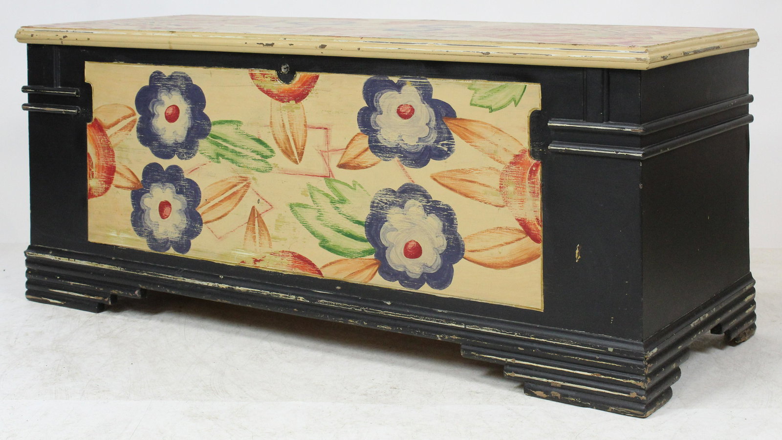 Art Deco Paint Decorated Cedar Chest: Ca. 1930 cedar chest in an Art Deco design with a free hand paint decoration of red, blue, & green flowers on a cream background and blue ends. Good condition. 48" long, 19" d, 20" high.