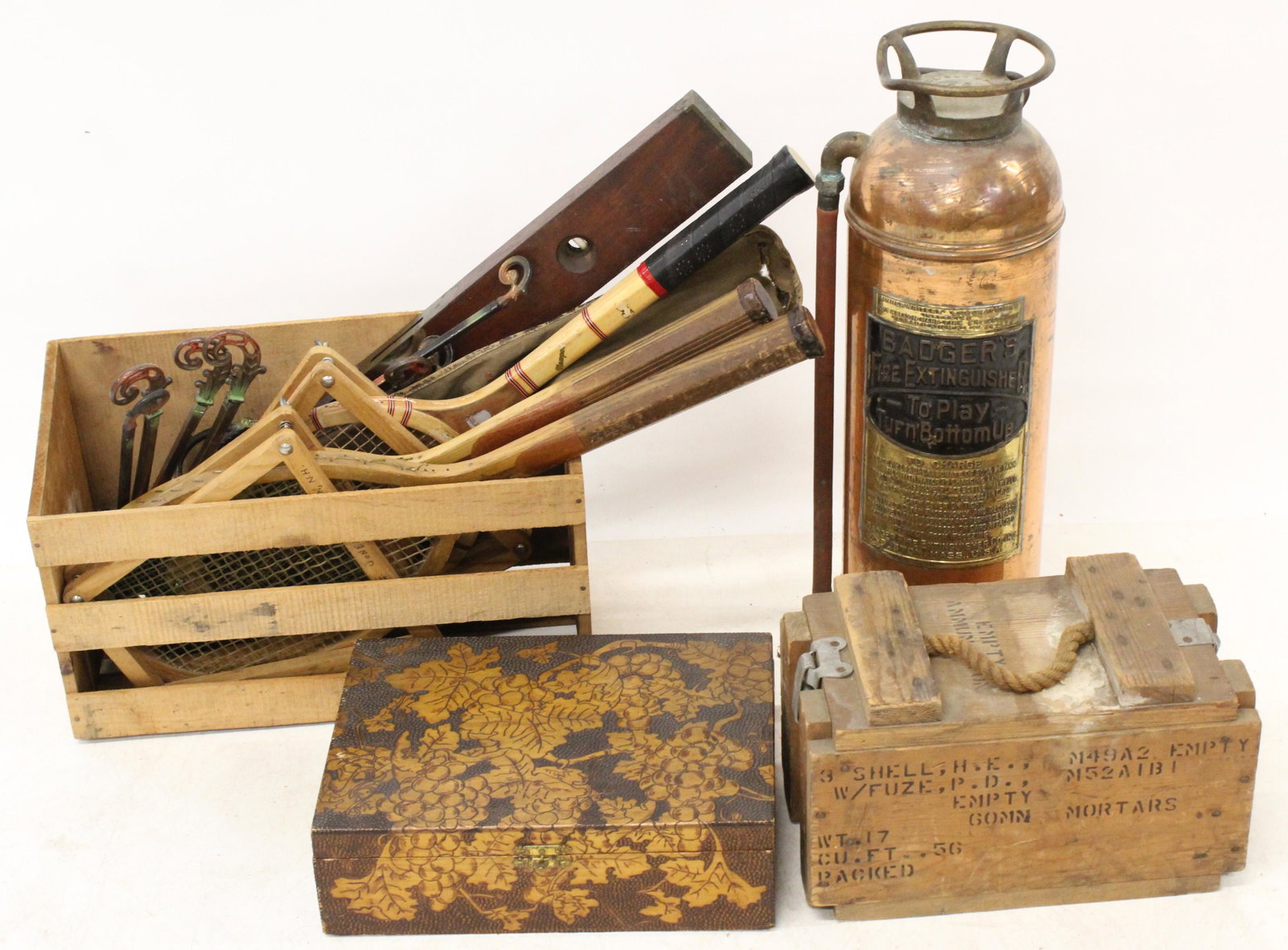 Group of Assorted Accessories incl. Pyro Box: Large group of assorted accessories including wooden asparagus crate, pyro decorated box, 1920's cast iron curtain rods, tennis rackets, copper fire extinguisher, ammo crate, etc.