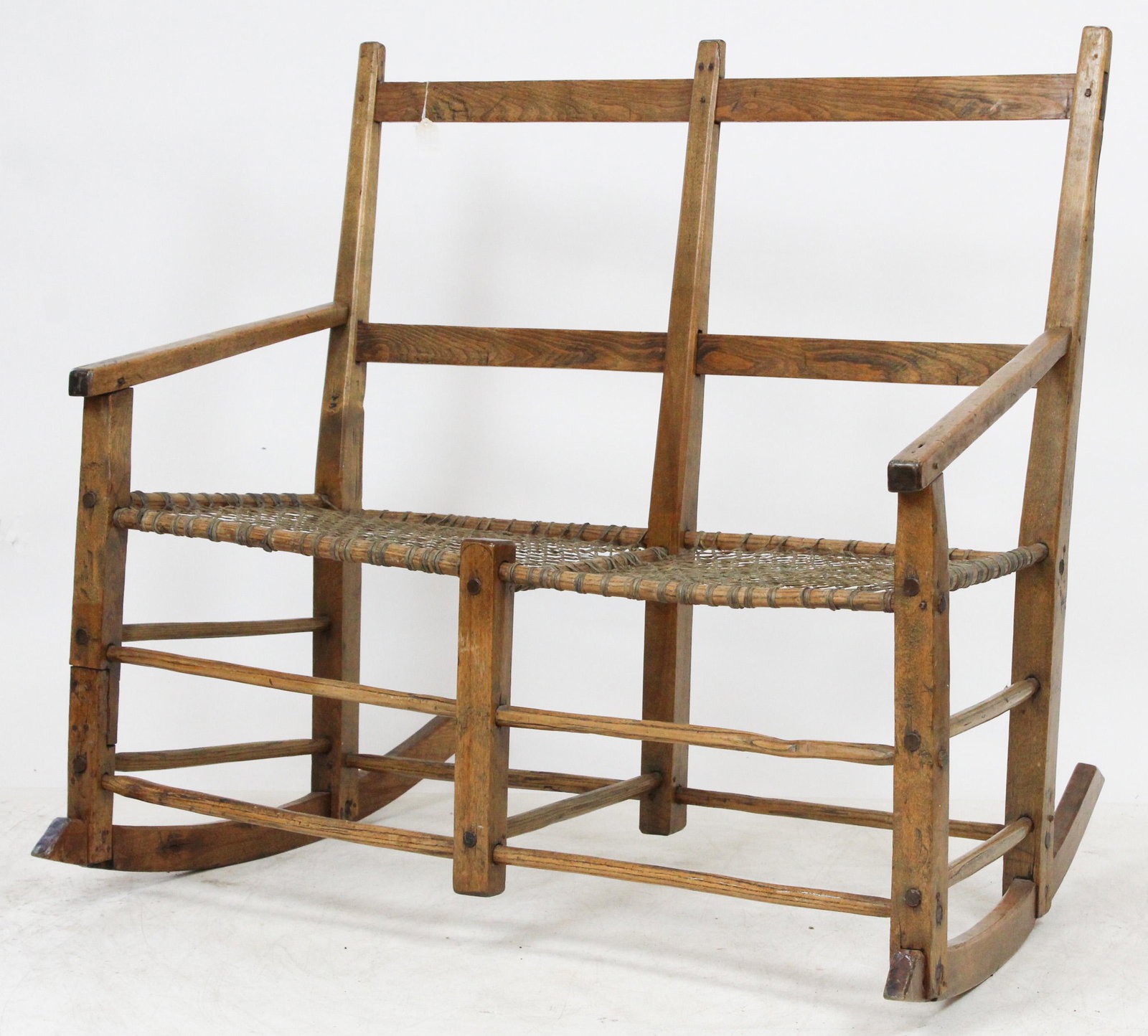 Quebec Snow Shoe Settee: 19th c Quebec Snowshoe rocking settee 38" wide 16" deep 17" to seat. As found with rawhide wrapped seat.