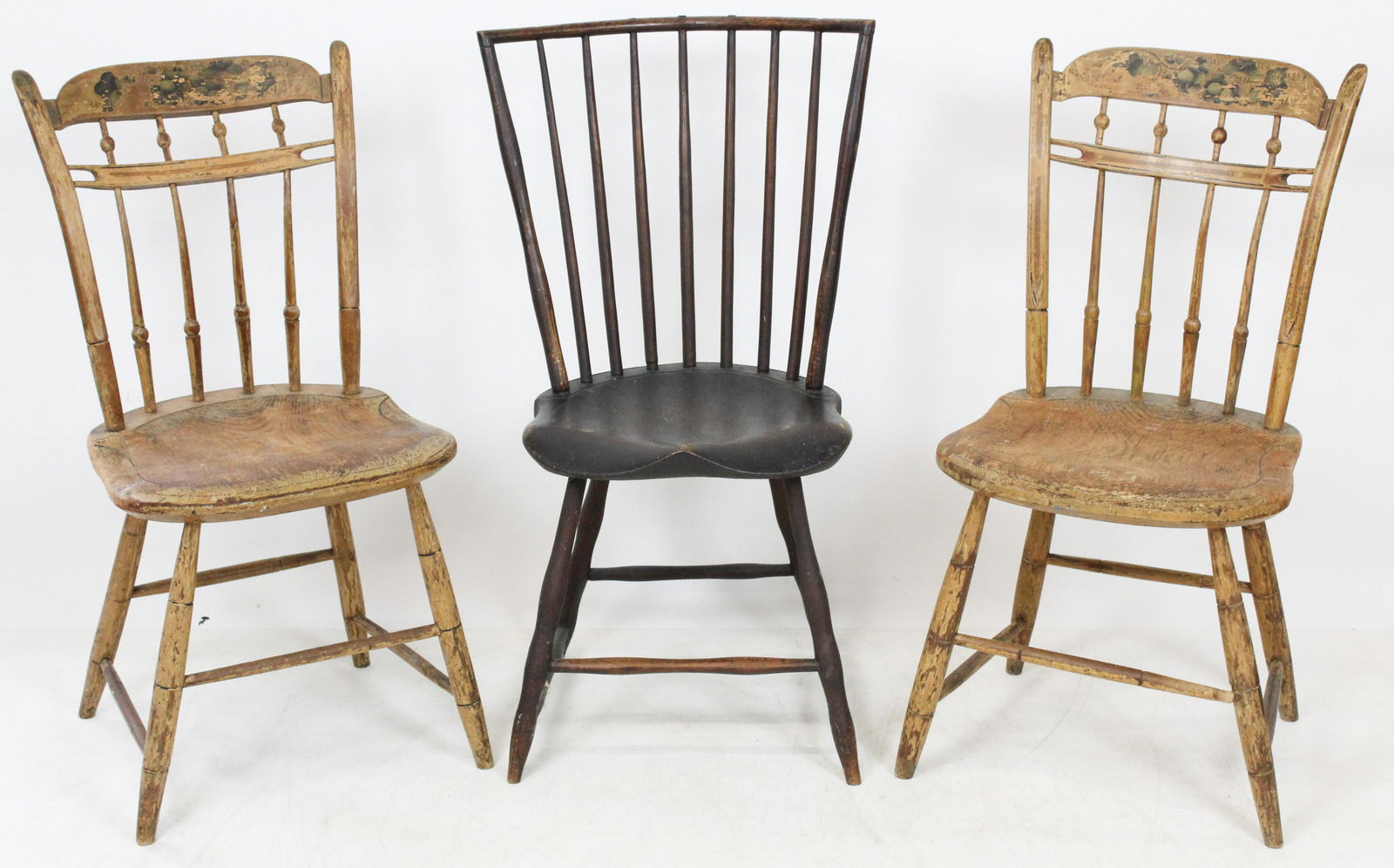 Three Windsor Chairs: Pair of Unusual Fishtail 1/2 spindle bamboo windsor chairs in traces of chrome yellow paint, dry and slightly loose. Sold with additional Saddle seat windsor side chair
