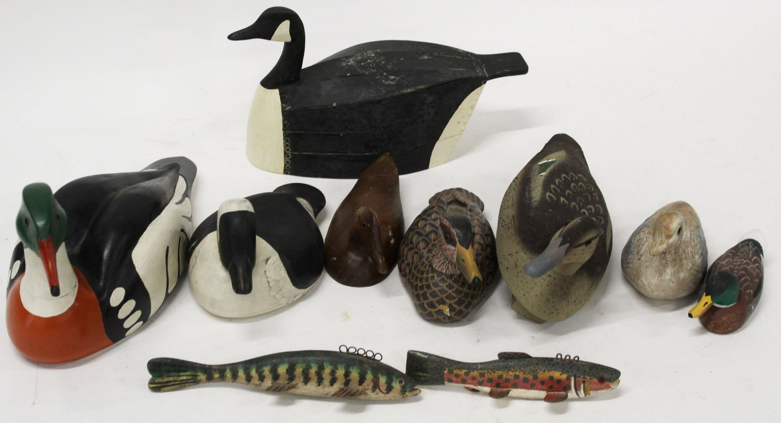 Collection of 20th c Decoys: Three Gary M Starr decoys including Bufflehead Drake #69 1989 10",#16 Red Breasted Merganser 1989, Slat back Goose 1989,unmarked LL Bean type miniature mallard hen corkbody, three small unmarked decoy