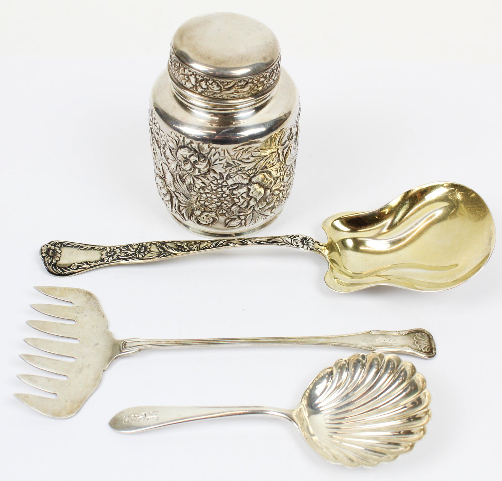 Gorham Sterling Tea Caddy and Assorted Flatware: Gorham Aesthetic Movement sterling silver floral repousse tea caddy and 3 pcs. assorted serving flatware including S. Kirk "King" pattern asparagus server, S. Kirk "Wadefield" pattern bon bon spoon wi
