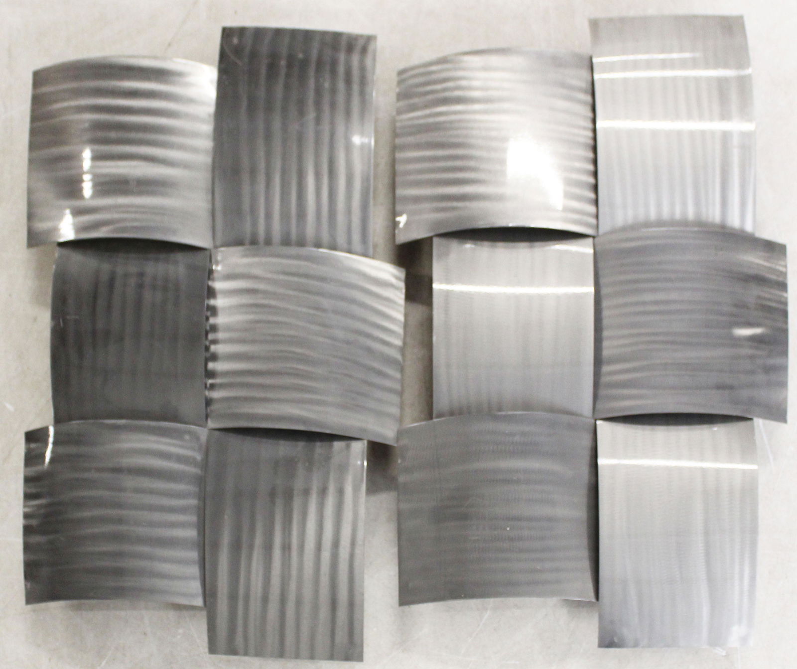 Pair of C Jere Brushed steel panels: Pair of brushed steel brutalist wall panels attributed to Curtis Jere studios each panel measures approx 19 x 29"