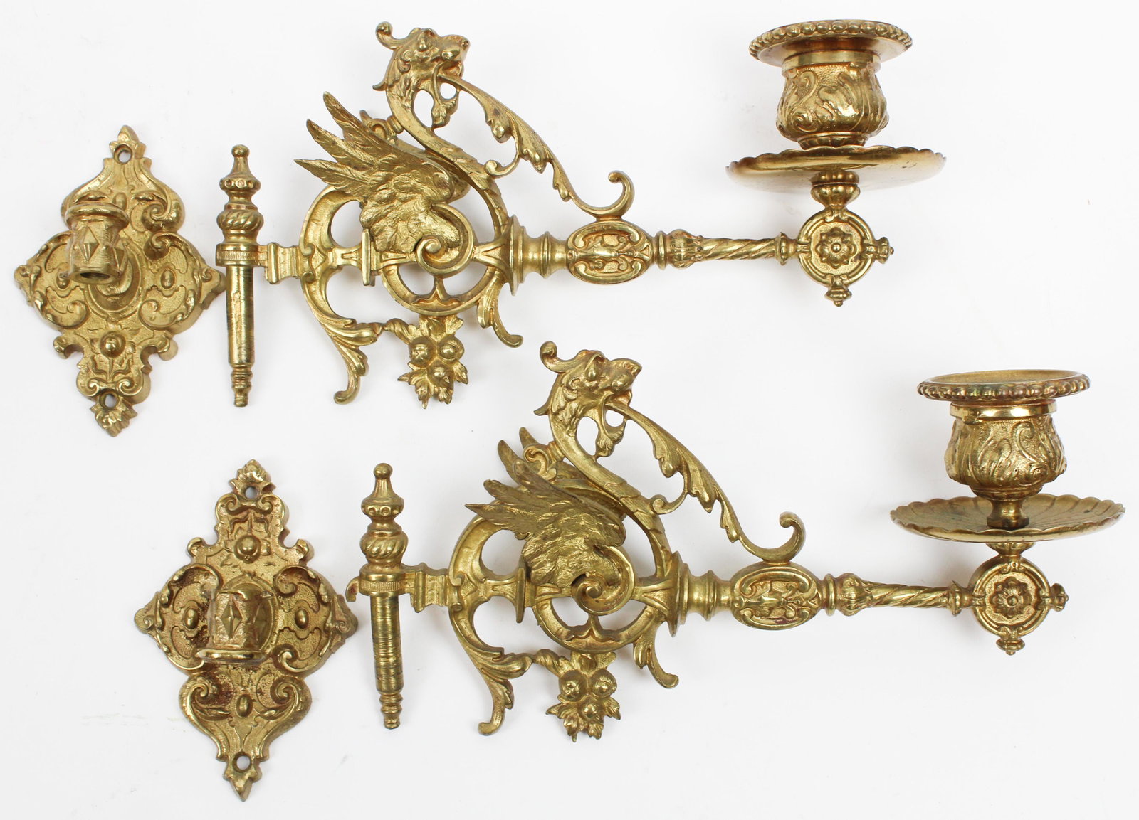 19th c French Gilt Brass Candle Sconces: 19th c French gilt brass candle sconces, swing arm, winged griffins, excellent detail in the casting, length 8 1/2", with wall mount brackets, ht 3 3/4"