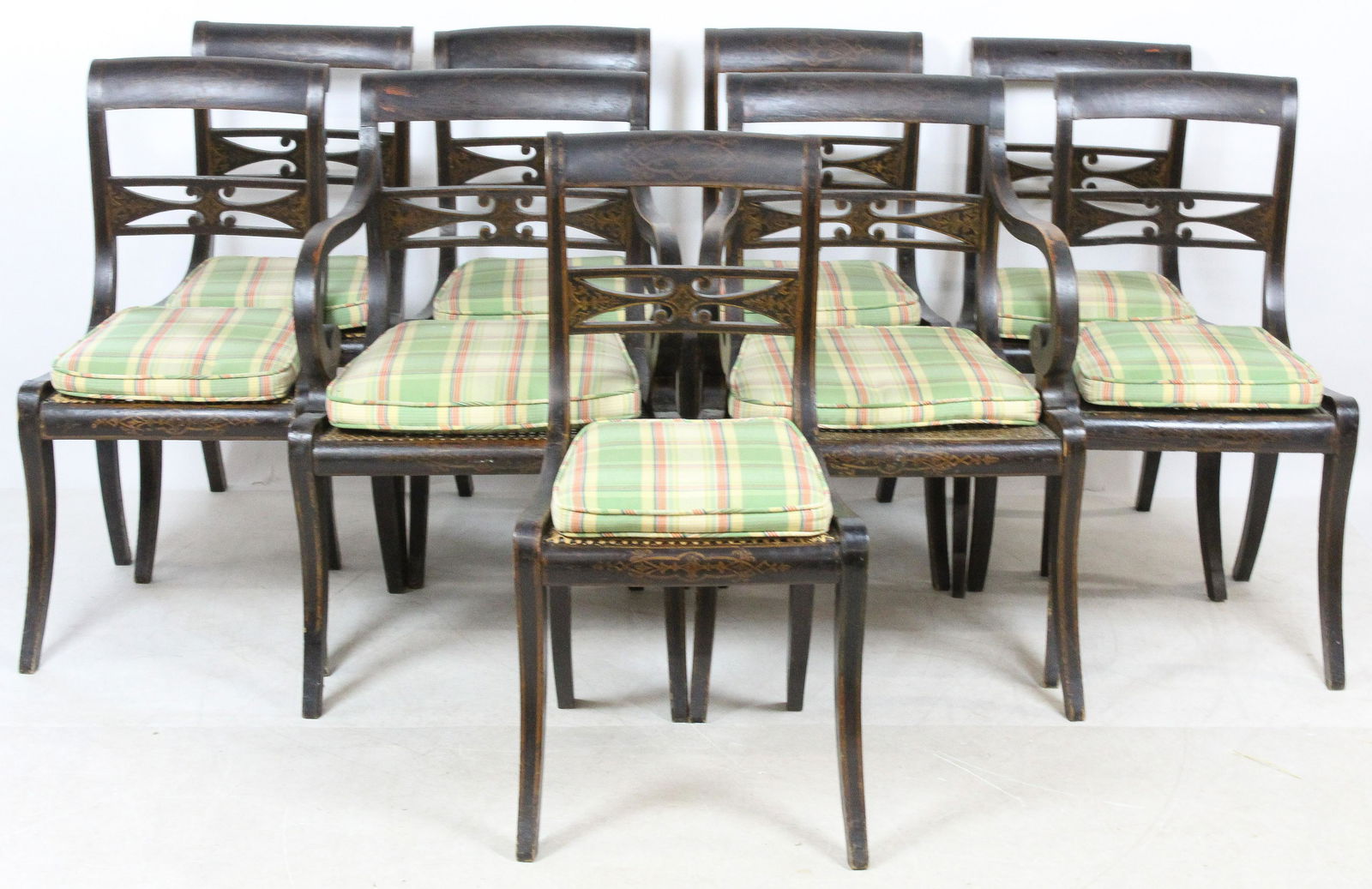 Set of Nine Regency Painted Dining Chairs: Set of nine Regency painted caned seat dining chairs, including rolled arm armchair