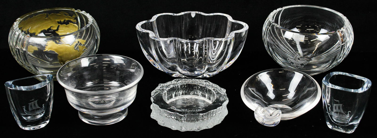 8 pcs. Crystal Art Glass incl. Steuben, Orrefors: Group of 8 pcs. of contemporary crystal art glass including elegant Orrefors lobed centerpiece bowl, Steuben handled dish, 2 Mikasa presentation rose bowls-one engraved with continents in gold, one wi