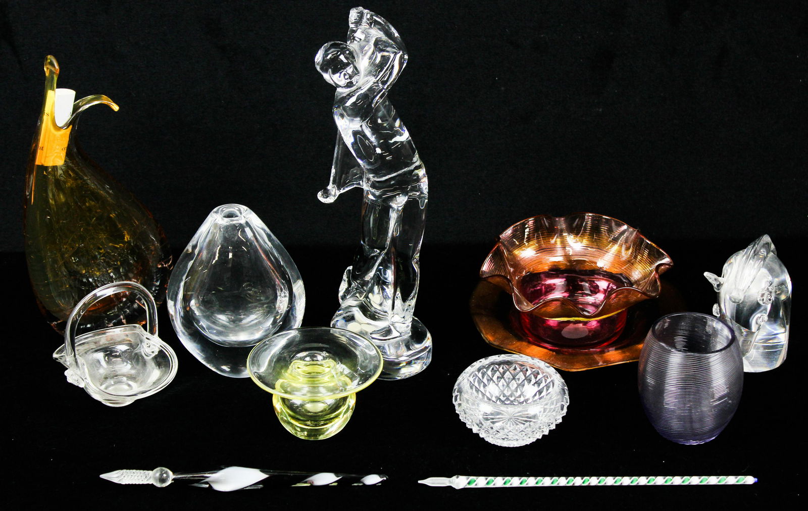 Art Glass Items incl. Steuben, Baccarat, Orrefors: Collection of 12 small art glass items including signed Baccarat golfer figurine, Steuben mid century horse head figure, Stevens & Williams English cranberry ruffled finger bowl with amber treaded dec