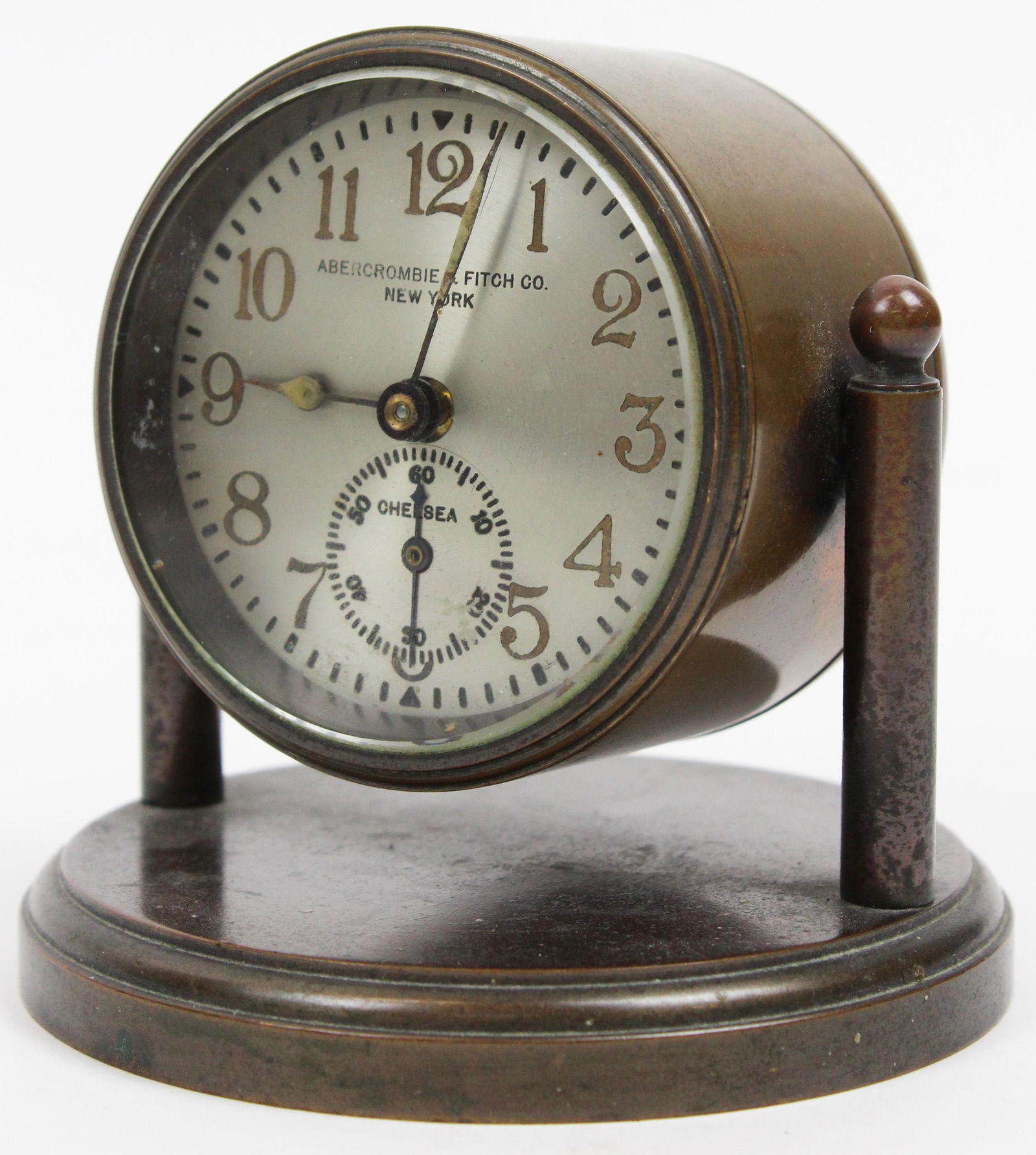 Abercrombie & Fitch, NY Chelsea Desk Clock: Abercrombie & Fitch Company, New York Chelsea desk clock, heavy bronze frame, clock diameter 3", base diameter 4 1/8"