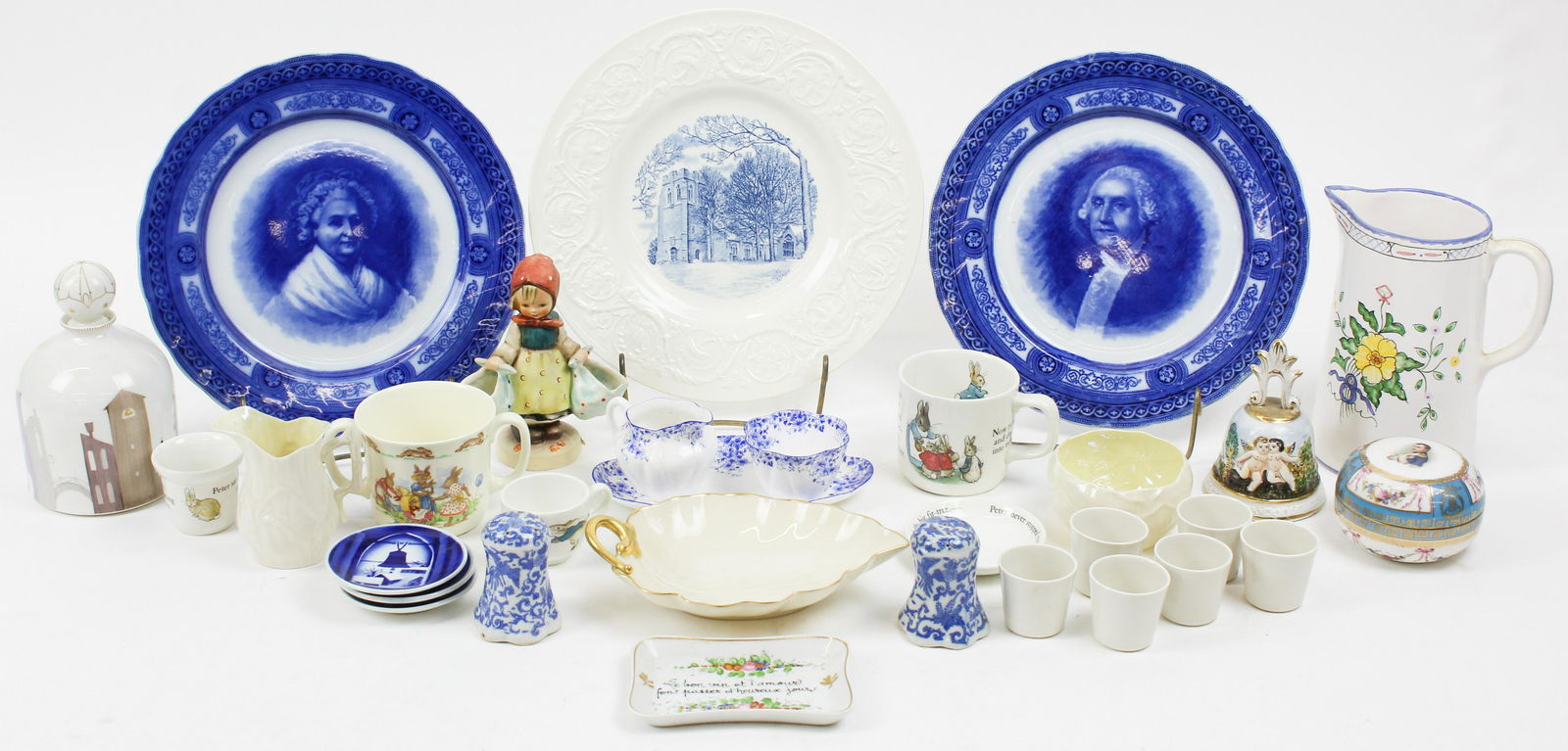 Assorted Porcelain incl. Shelley, Limoges, KPM: Group of assorted porcelain items including 7 pc. KPM mid century town scene cordial set, Shelley sugar creamer and undertray, Belleek sugar and creamer set, Hummel "Mother's Darling" figurine, Napole