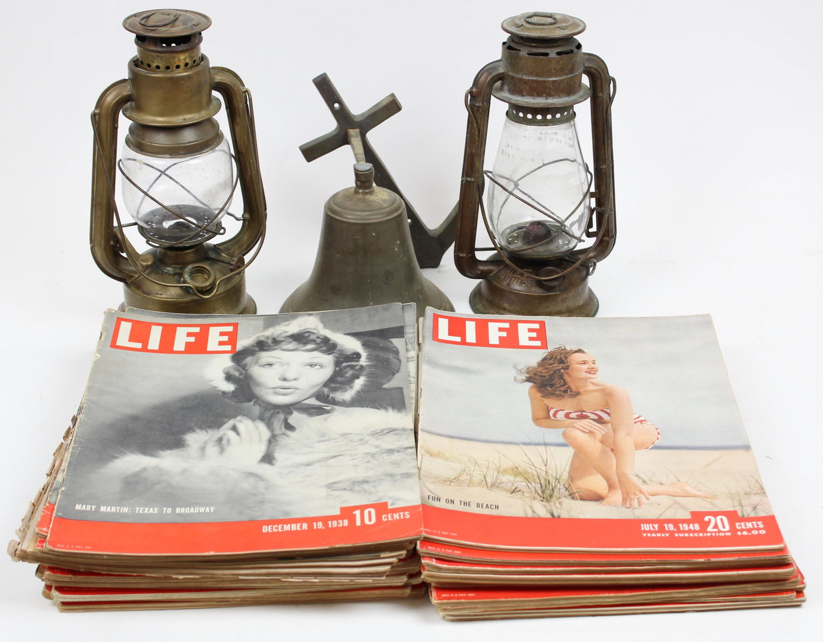 Brass Ship's Bell, Barn Lanterns, Life Magazines: Brass ship's bell, two Dietz, French brass lanterns, Life magazines, hts 9 1/2" to 12 1/4"