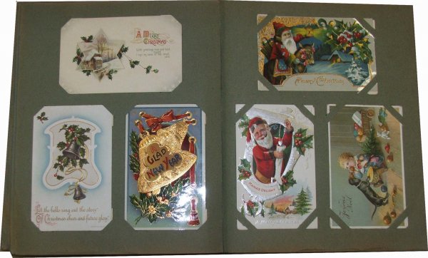 two 1908 postcard albums