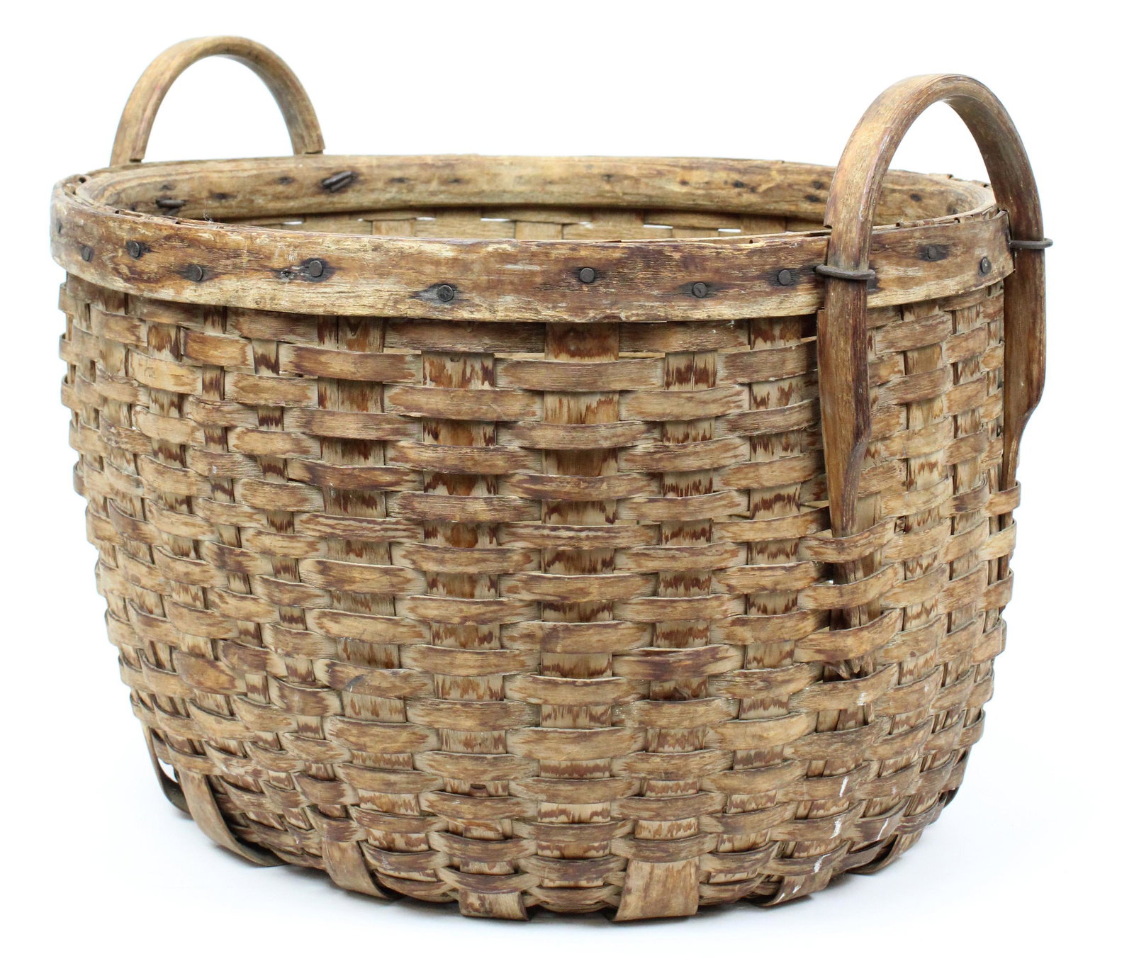 Ca 1900 Double Handled Farm Basket: Ca 1900 double handled farm basket, nailed rim, curved cuts on the cross-staves, slight damage commensurate with age and use, diameter 19", ht 12 1/2"