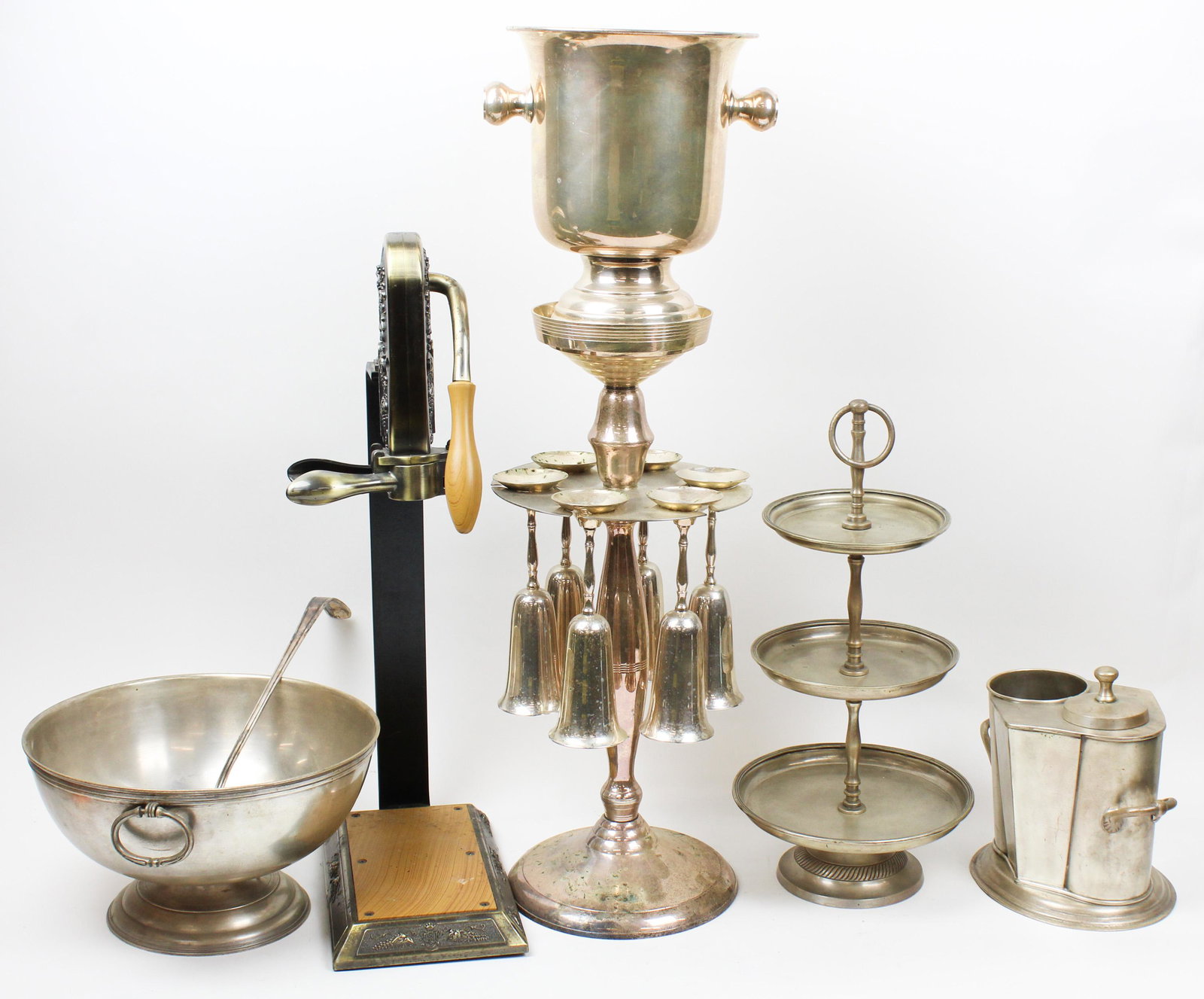 Entertaining Accessories, Champagne Bucket: Group of elegant entertaining accessories including Franmara Le Grape brass plated counter mount wine bottle opener corkscrew, silver plated champagne bucket with stand and 6 flutes, dumbwaiter, bottl