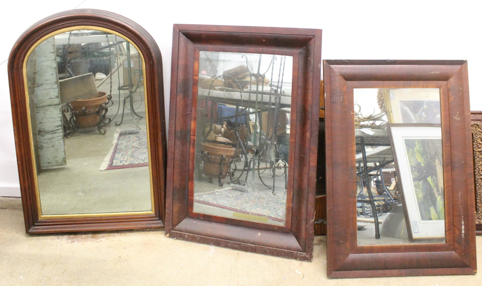 3 Mahogany Ogee and Black Walnut Mirrors: Group of 3 mirrors including 2 mid 19th c. mahogany veneered ogee mirrors, accompanied by a Victorian arched top black walnut mirror with lemon gilt liner ht. 33"-41"