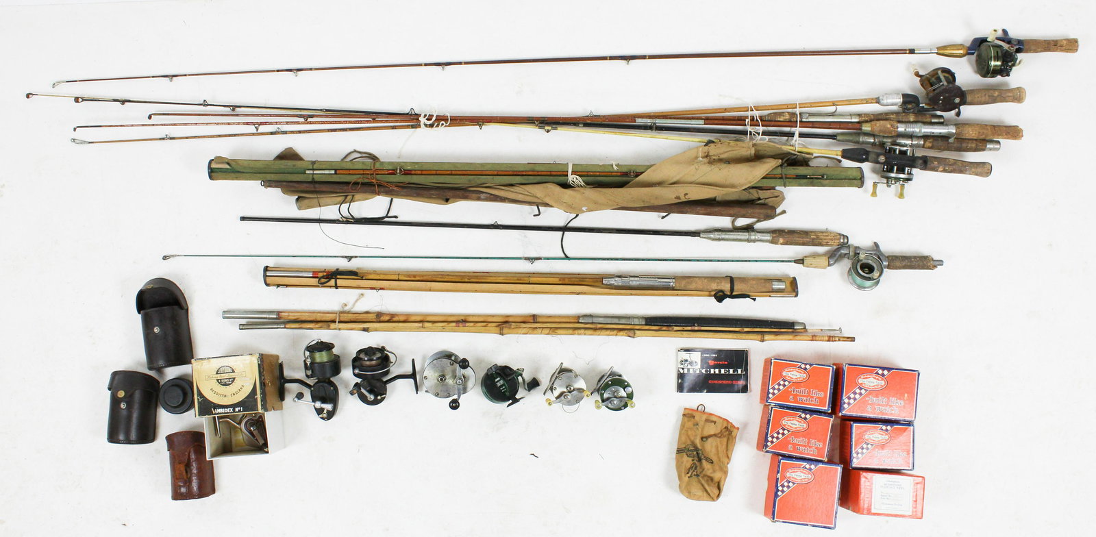 Vintage Baitcasting Reels, Spinning Reels, & Rods: Vintage baitcasting reels, spinning reels, and rods, including J W Young & Sons Redditch England spinning reel in original box, Mitchell 300 spinning reel, Cap spinning reel, 6 original Shakespeare ba