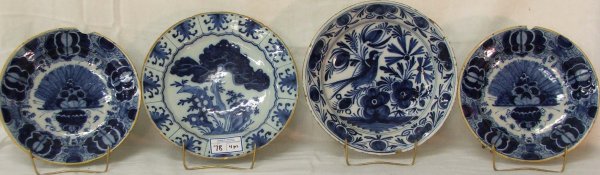 Four 18th century flow blue Delft bowls: Four 18th century flow blue Delft bowls