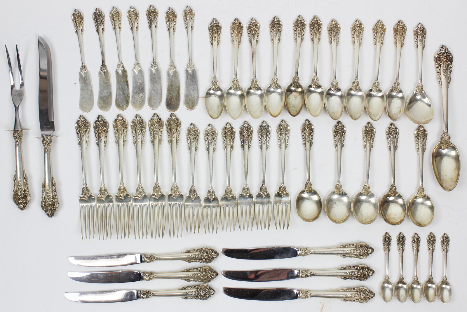 48 pcs. Wallace Grande Baroque Sterling Flatware: 48 pcs. Wallace "Grande Baroque" pattern sterling silver flatware including 6 dinner forks, 5 soup spoons, 10 teaspoons, 5 dessert forks, 10 teaspoons, 5 dessert forks, 5 demitasse spoons, 7 butter sp