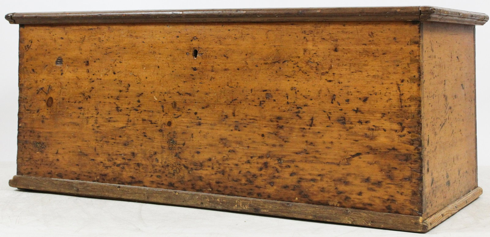 19th c Lift Top Chest: Early 19th or late 18th c American pine lift top chest. Cleaned front, top, and sides. Back in old grain paint over other paints. Dovetailed & molded construction. 51" w. 23"d, 21"h. Appropriate wear,