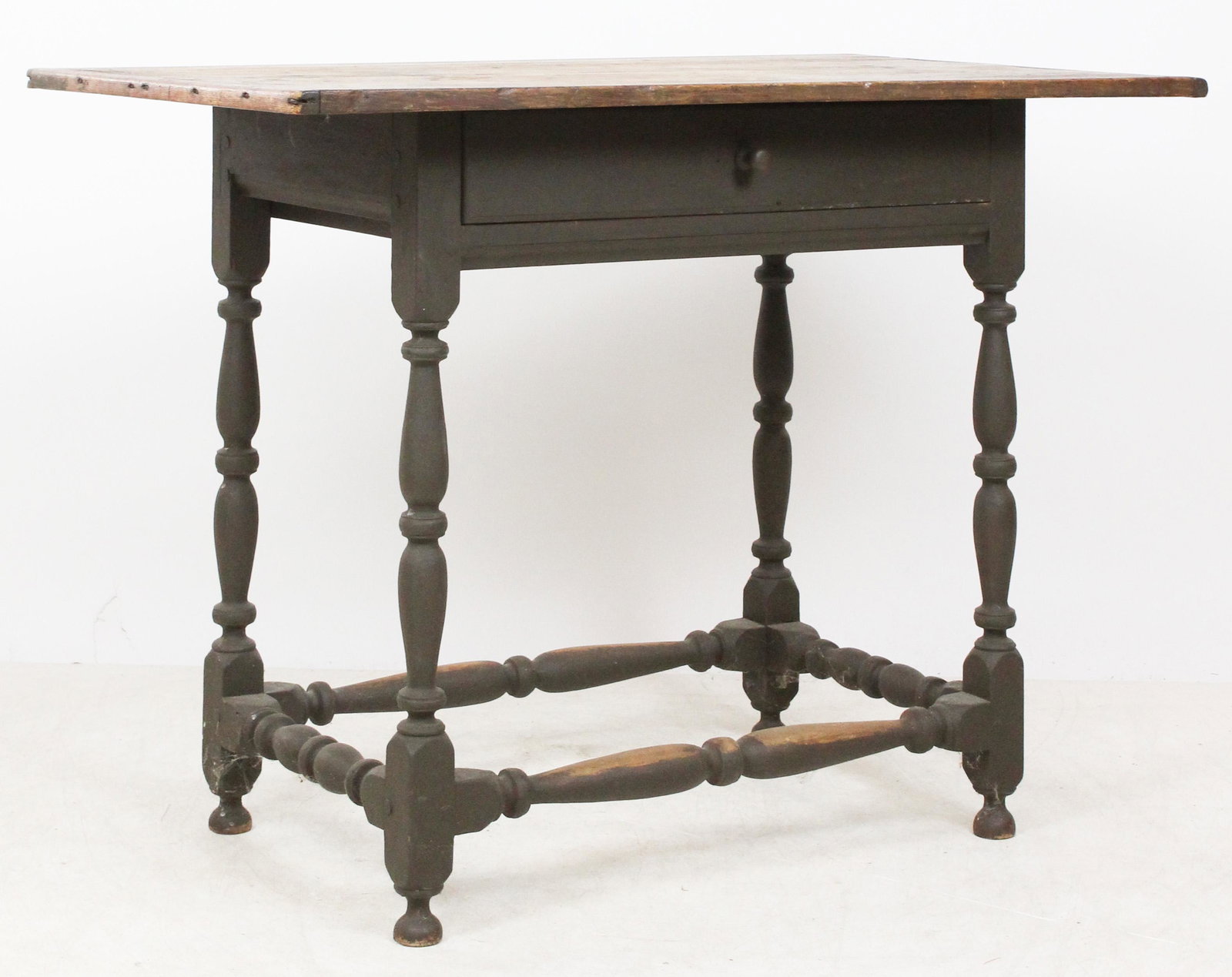 18th c Tavern Table: 18th c New England single drawer tavern table. Two board top with bread board ends. Single drawer, maple turned legs with stretcher base. Grey paint over the old red on base. Scrubbed top, overall goo