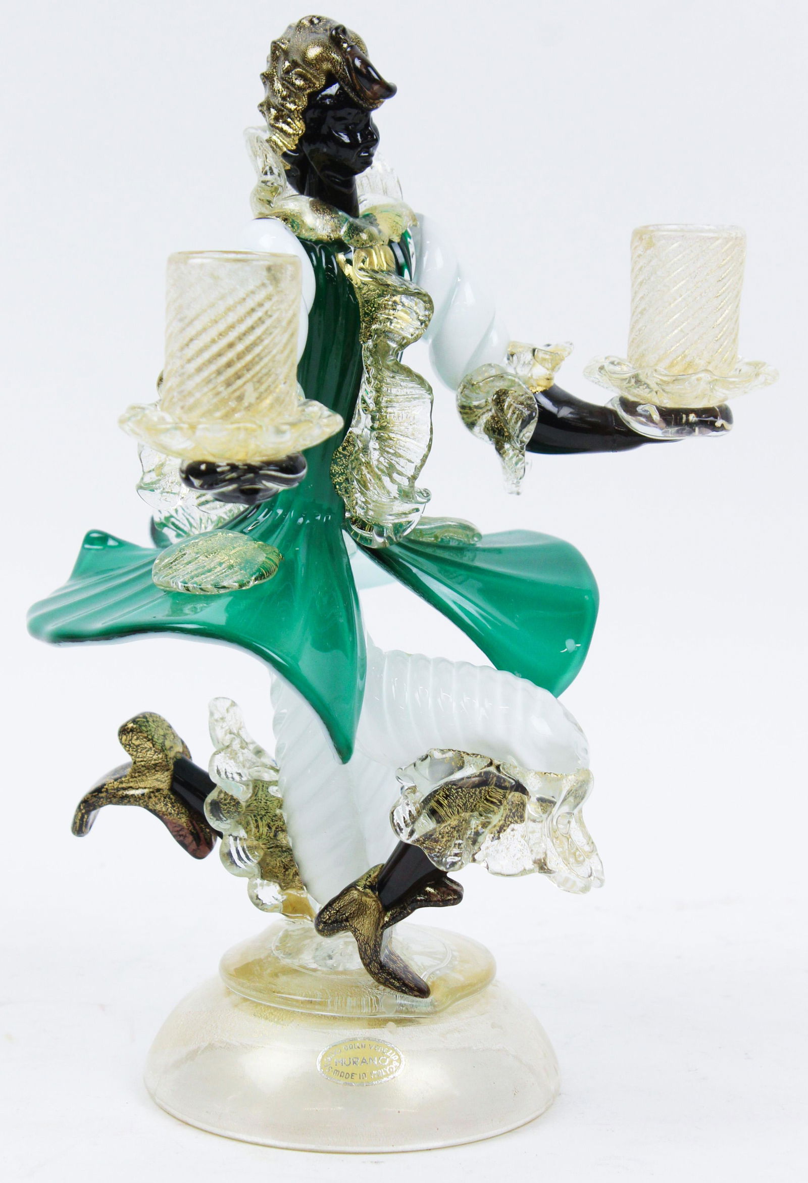 Seguso Dall Murano Glass Blackamoor Candelabra: Vintage Seguso Dalla mid century modern Murano Venetian glass blackamoor double arm candelabra with emerald green cased coat, gold fleck accents, having original foil label 10" x 7" x 6" -right hand a