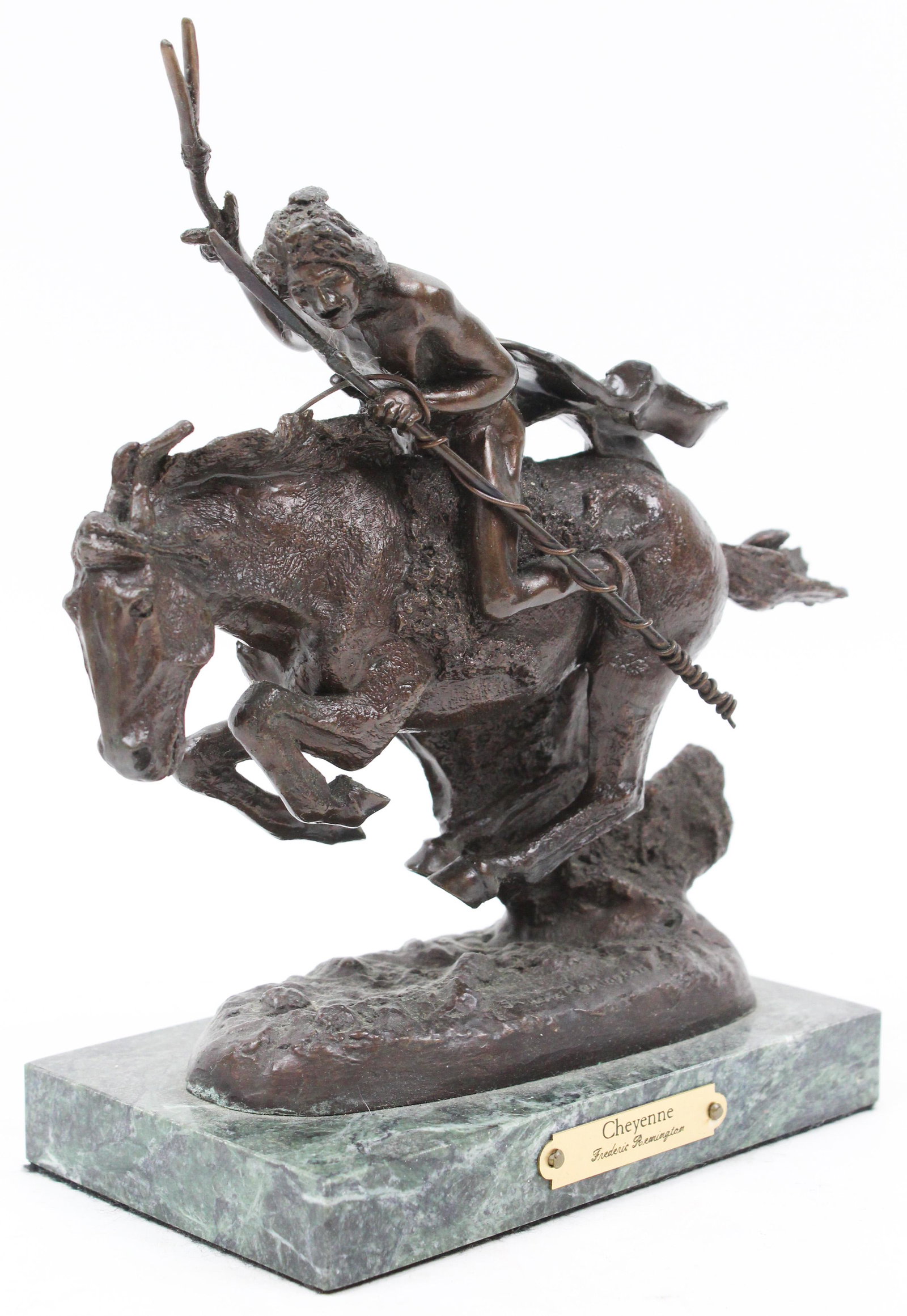 After Frederic Remington Cheyenne Bronze: After Frederick Remington "Cheyenne" bronze mounted on marble base, length 8"