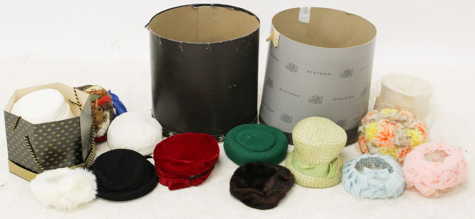 Lot of Vintage Ladies Hats: Lot of vintage ladies hats including multi-colored feathered, straw, velvet, wool pill box, fur, etc.