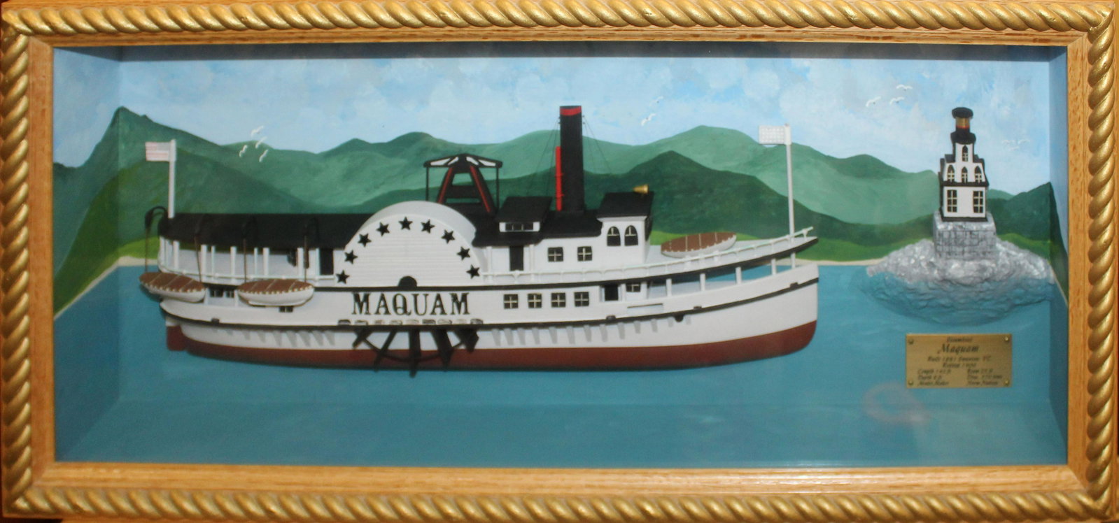 Circa 2012 Diorama "Maquam": Circa 2012 Diorama of the Lake Champlain paddlewheeler "Maquam" with Colchester Reef Lighthouse in background by Normand Nadeau 28 x 14 x 5"