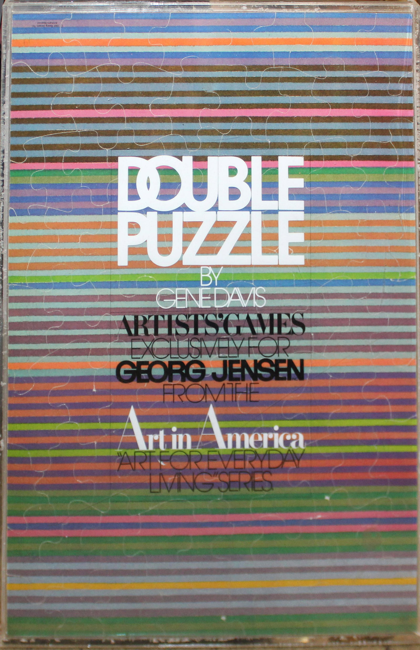 1969 Gene Davis for Georg Jensen Double Puzzle: Gene Davis for Georg Jensen double-sided 82 piece uncut puzzle, 1969, produced for the "Art in America: Art for Everyday Living" series of artist's games, signed in lower right corner on each side, mo