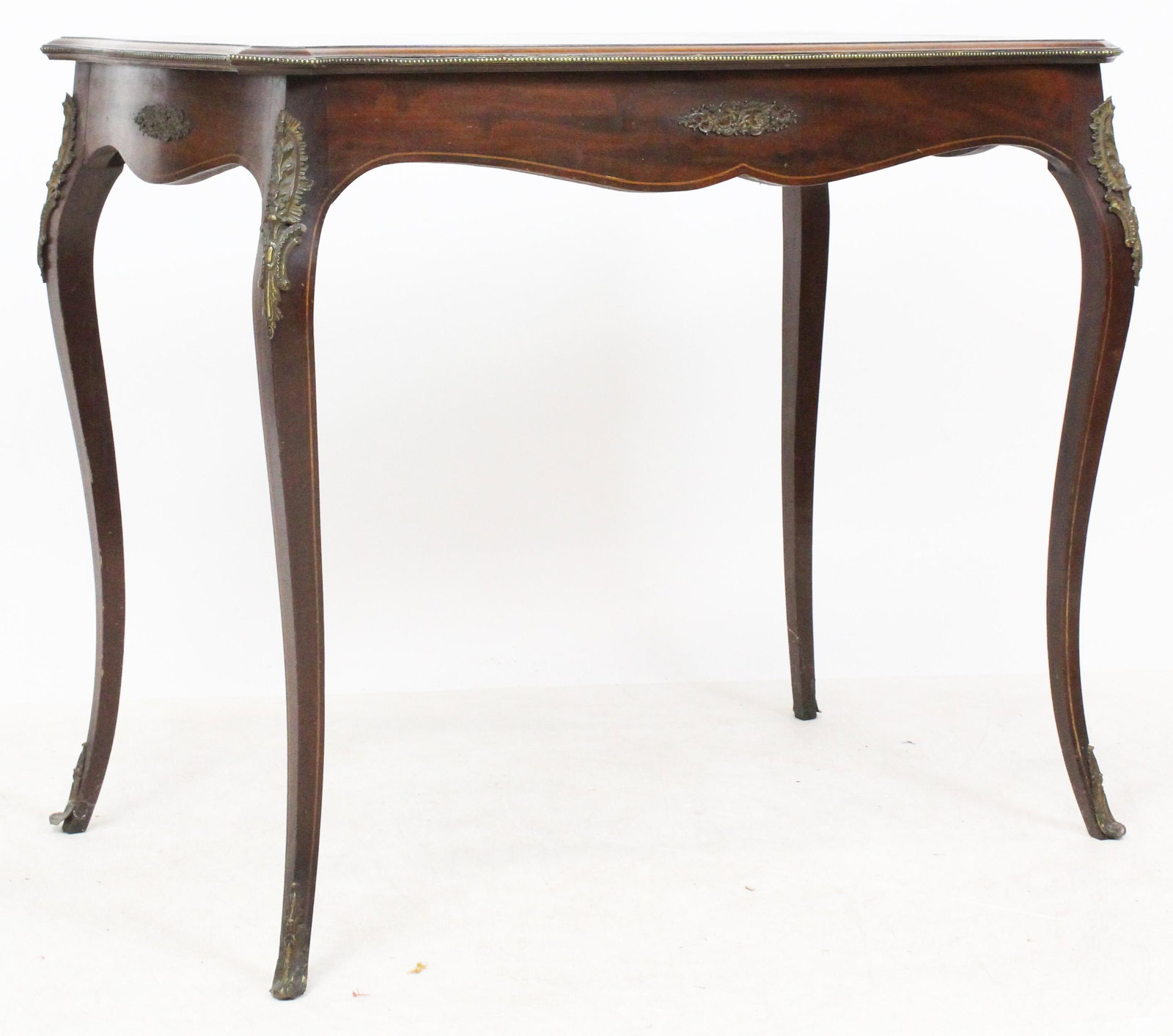 19th c Louis style Parlor Table: 19th c marquetry inlaid Louis style parlor table with floral inlays, and ormolu mounted decoration 35 x 21 x 29"