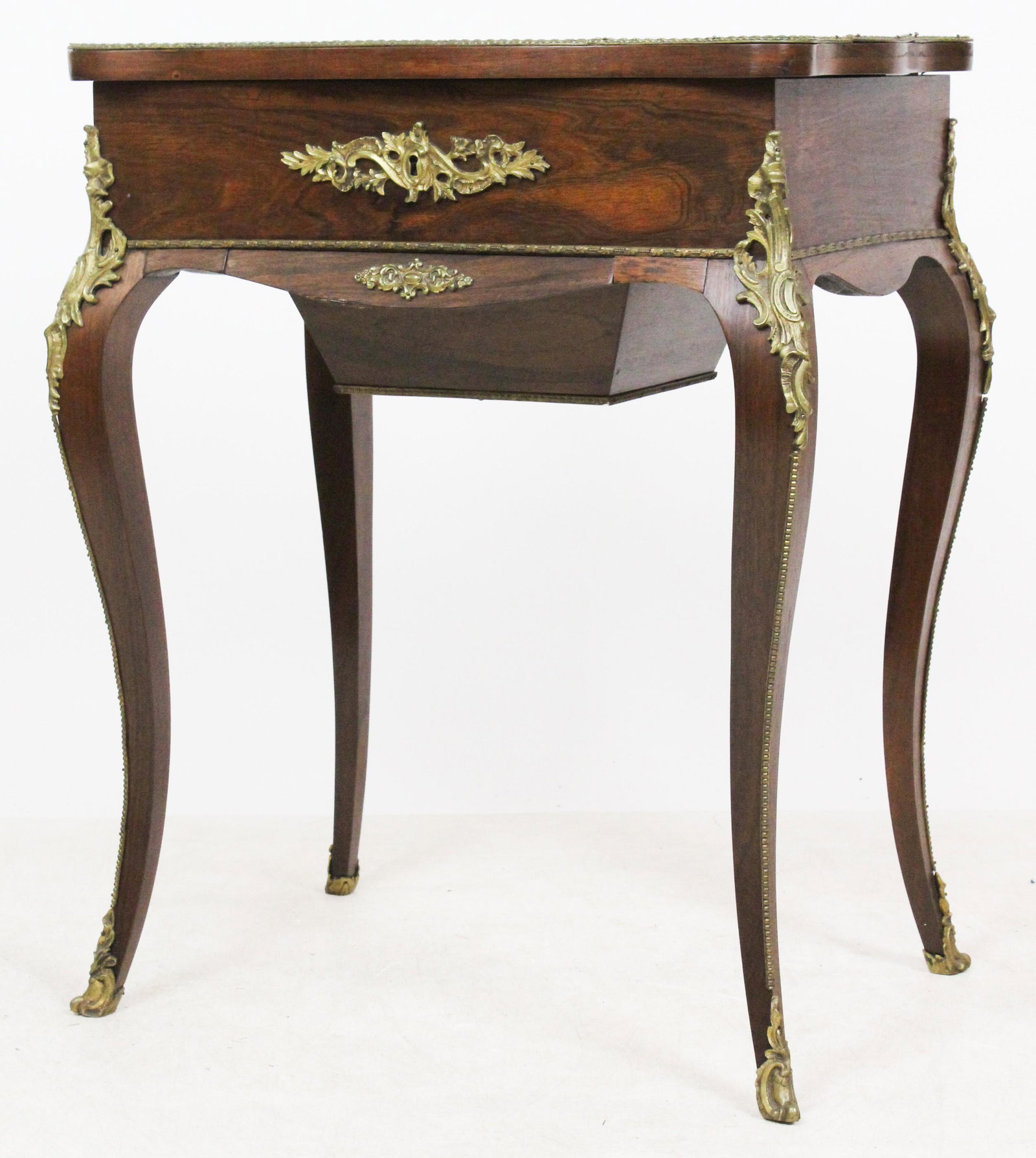 20th c Louis Style Dressing Table: 20th c Rosewood veneered ormolu mounted Poudre dressing table with work drawer 16 x 23 x 29"