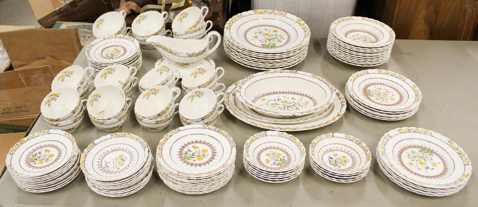 111 pcs. Spode Buttercup Porcelain Dinnerware: Approximately 111 pcs. Spode "Buttercup" pattern English porcelain dinnerware including serving items, dinner plates, side bowls and plates, coffee and tea cups and saucers, etc. -some dinner plates h