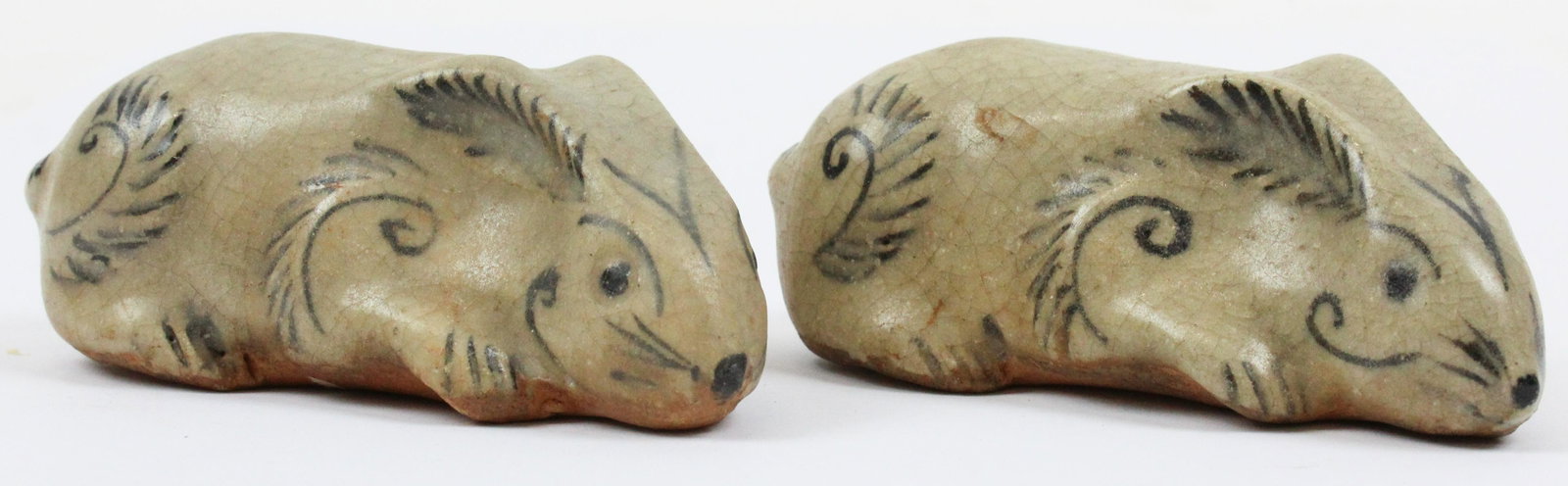 Chinese Ming Dynasty Glazed Rabbits: Two Chinese Ming Dynasty style pottery rabbits, underglaze decoration, mold seams, length 3 1/2" each, ex Iris Love