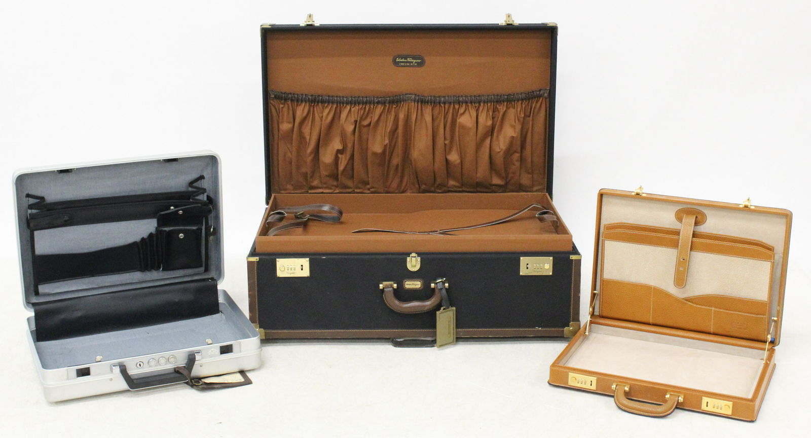 Vintage Ferragamo Suitcase, other Attache Cases: Vintage Ferragamo hard shell suitcase with combination locks (latch, handle damaged), Haliburton hardshell attache case, leather attache case, widths 29 1/2", 18", 16 1/2"