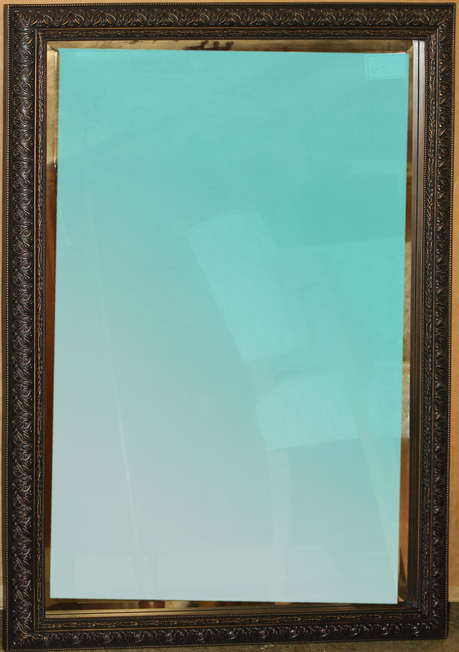 New Pottery Barn Beveled Glass Mirror: New Pottery Barn beveled glass mirror in antique gold finished filagree frame, with original box and packing material it was removed from, 41" x 28" -sold to benefit the Brattleboro Area Hospice
