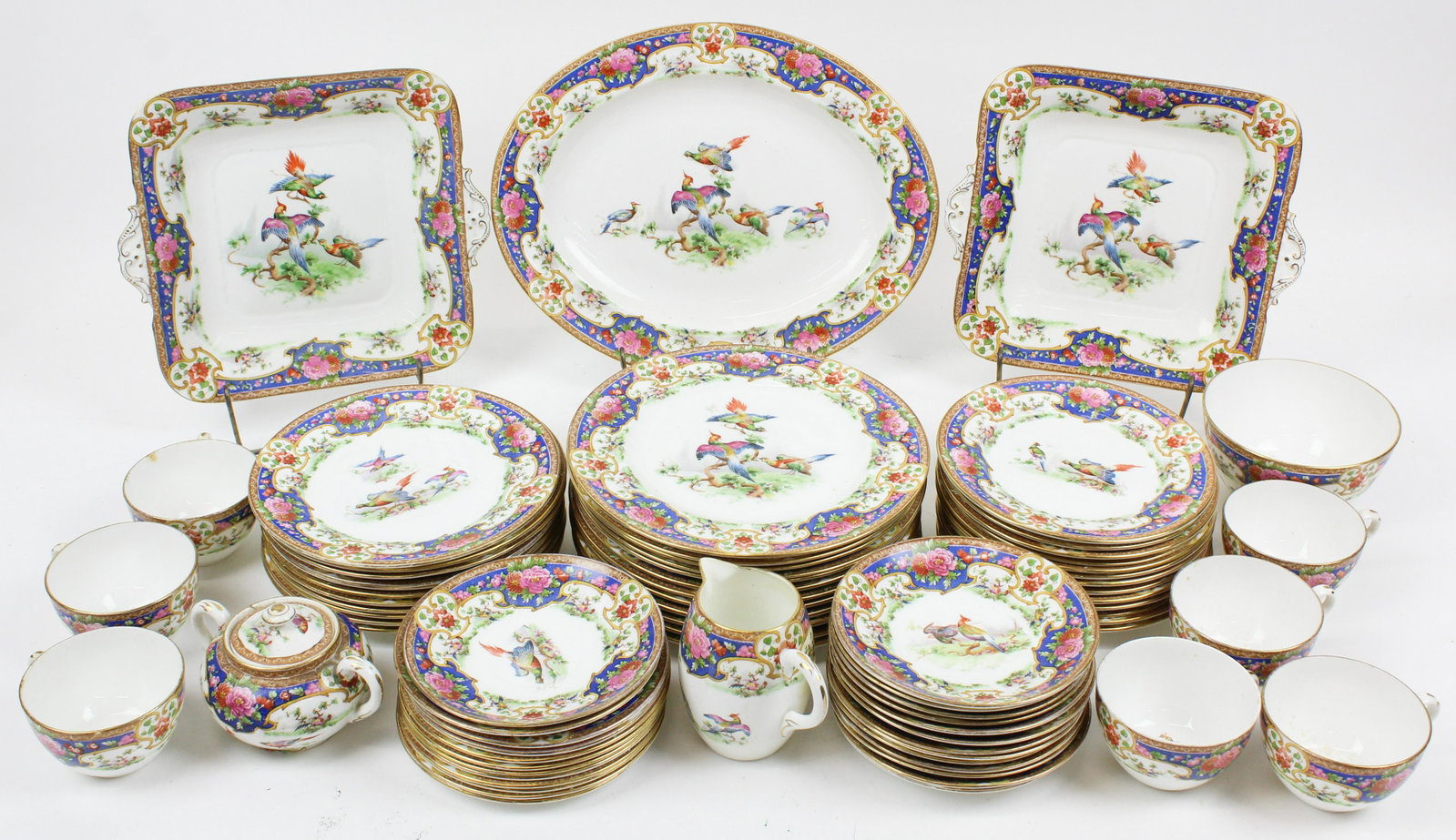 72 pcs. Shelley Old Sevres Bone China Porcelain: 72 pcs. Shelley "Old Sevres" pattern ca. 1920 porcelain dinnerware with brightly colored pheasant decoration, including two square cake plates, luncheon plates, side plates etc. -many teacups have che
