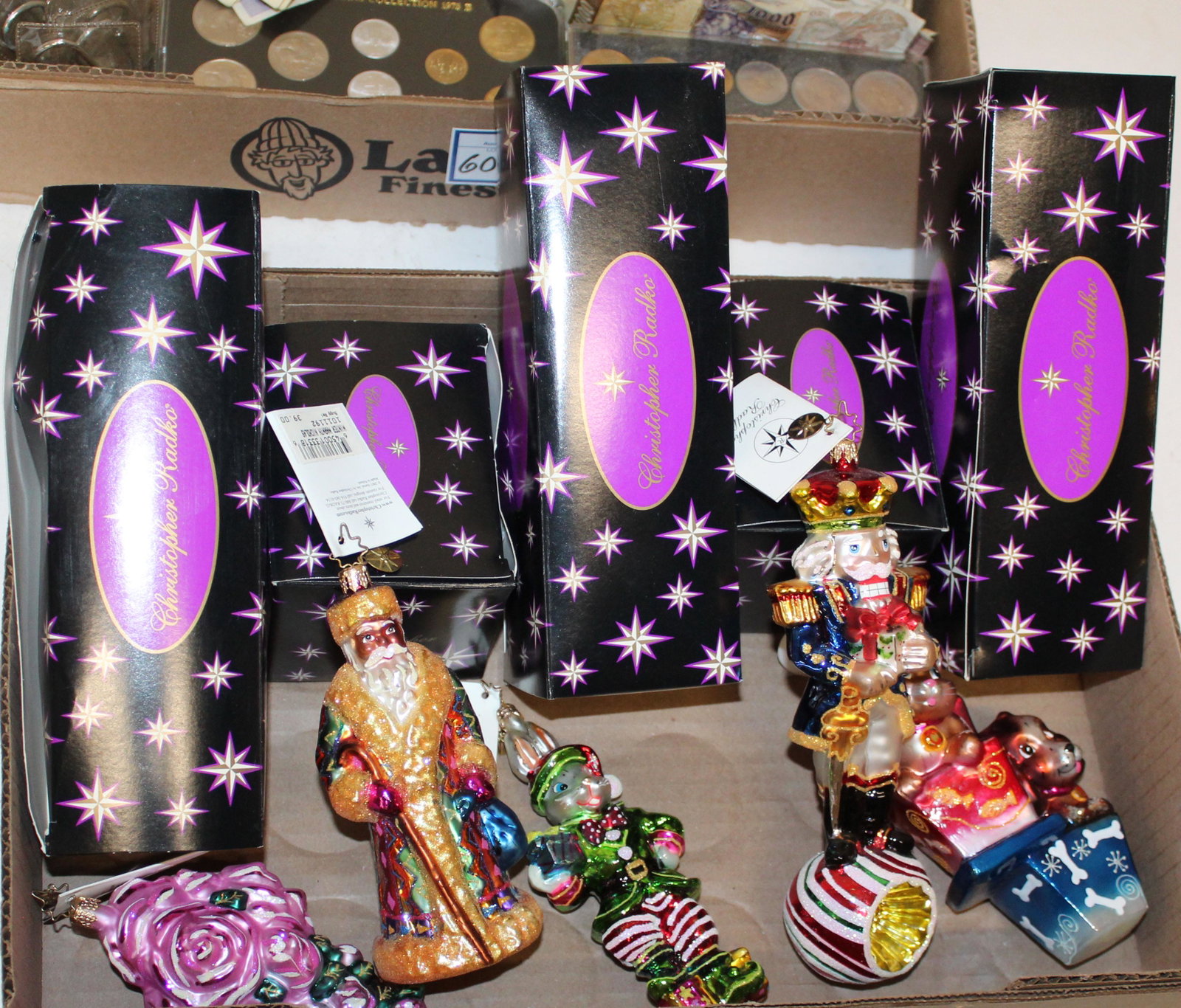 Christopher Radko Christmas Ornaments: Christopher Radko Christmas ornaments, including 2003 Santaland Bill, 20th Anniversary puppy & kitten, "Pretty Petals", with original boxes (two extra boxes- no contents), lengths to 5 1/2", ex Iris L