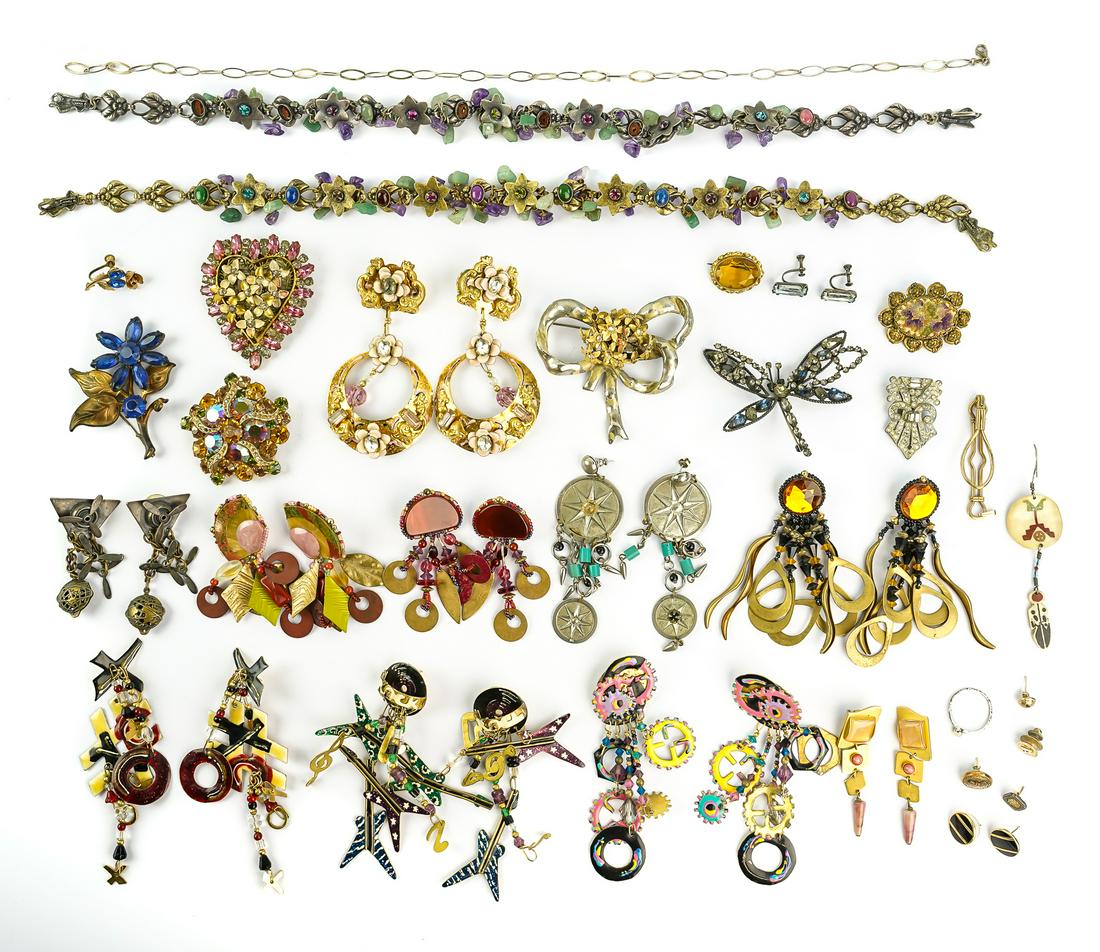 Designer Costume Jewelry: A group of vintage designer costume jewelry including several pair of earrings by Lunch at The Ritz, necklaces by Mary Demarco, brooches by Robert Fashion Craft, Susan Richardson, and more.