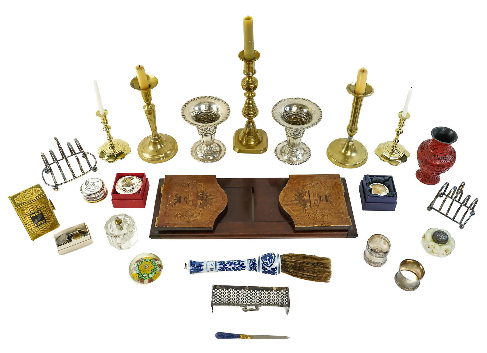 Group of Decorative Accessories, Candlesticks: Group of decorative accessories including marquetry inlaid mahogany bookrack, 3 brass candlesticks, pair of Virgina metalcrafters Colonial Williamsburg Queen Anne style candlesticks, cinnebar style va