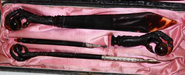 Tortoise shell cased four piece writing set with p: Tortoise shell cased four piece writing set with pen, pencil, letter opener and seal