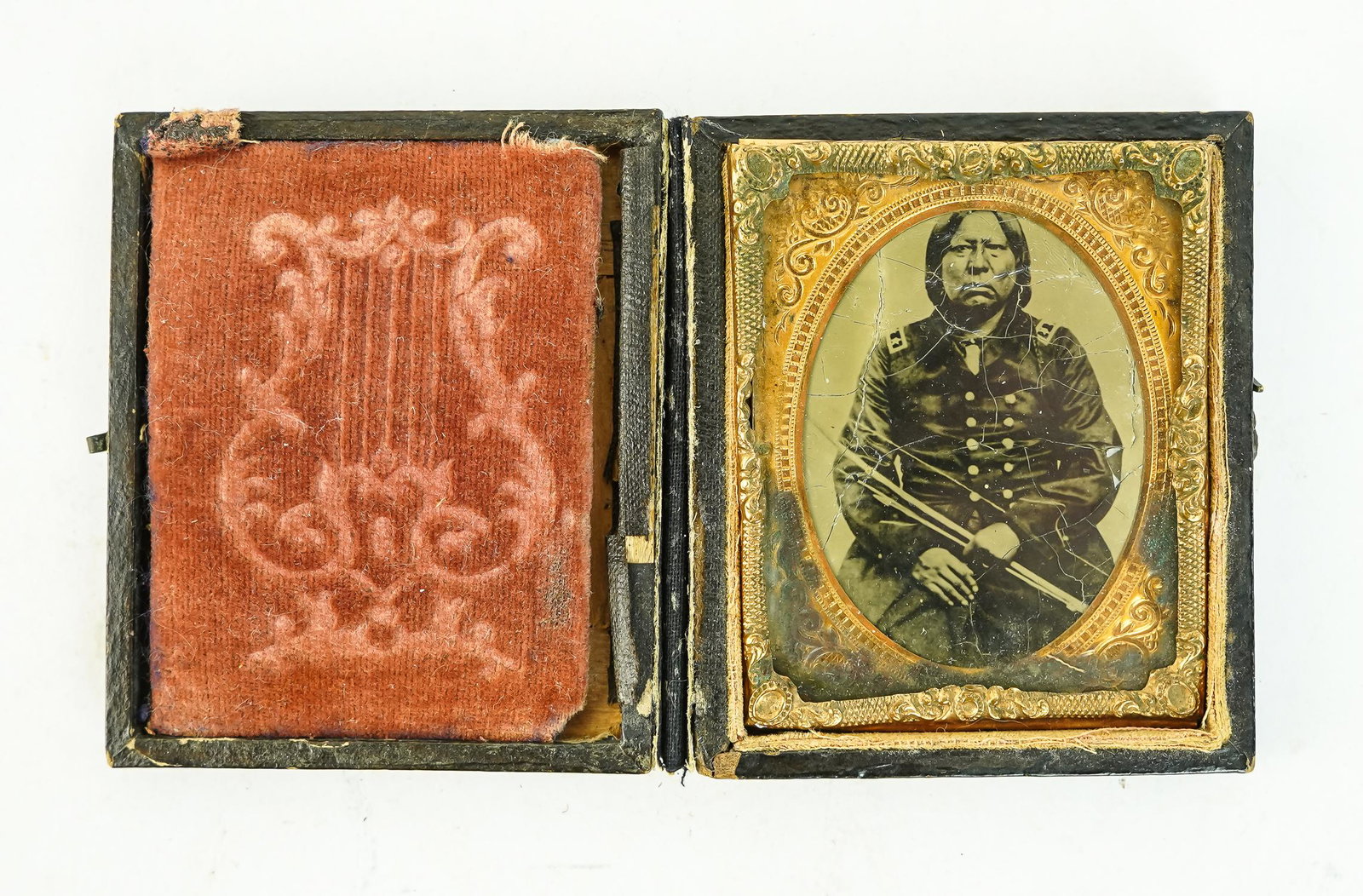 Native American Tintype: Modern 1/9th tintype of a Native American in US regulation officer's uniform with two stars on epaulets, in folding case, crackled surface, 2 1/2" x 2" (see Mike Kent Auctions, Monroe, GA, March 29, 2