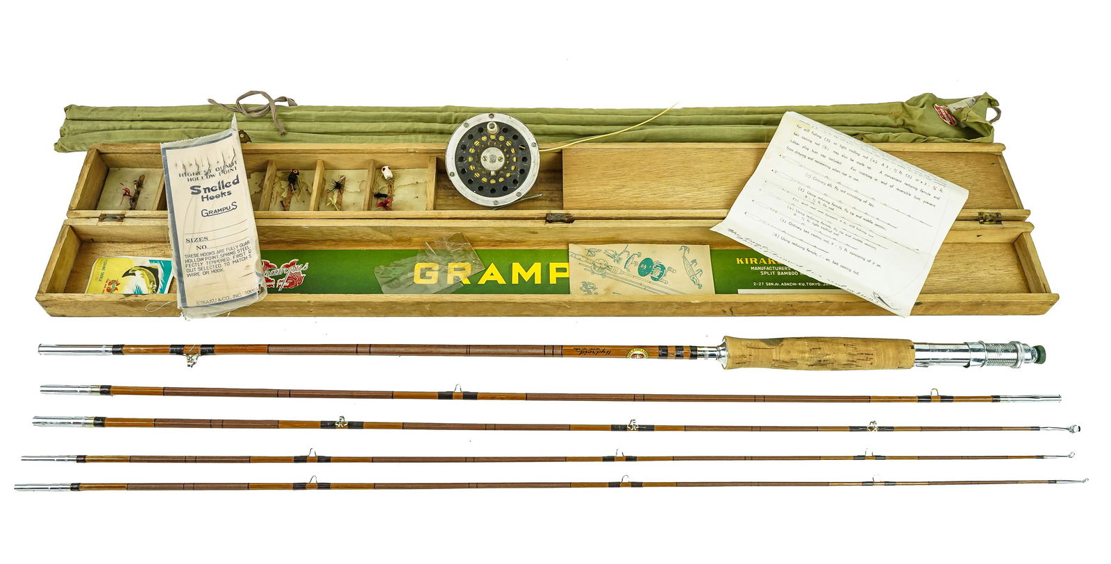Kiraku & Co Bamboo Fly Rod: A Kiraku & Co. 3 pc fly rod with 3 extra tips. 8' 3" total length, very good condition, in original box case with bag, & fly box side. Comes with a vintage Martin fly reel.
