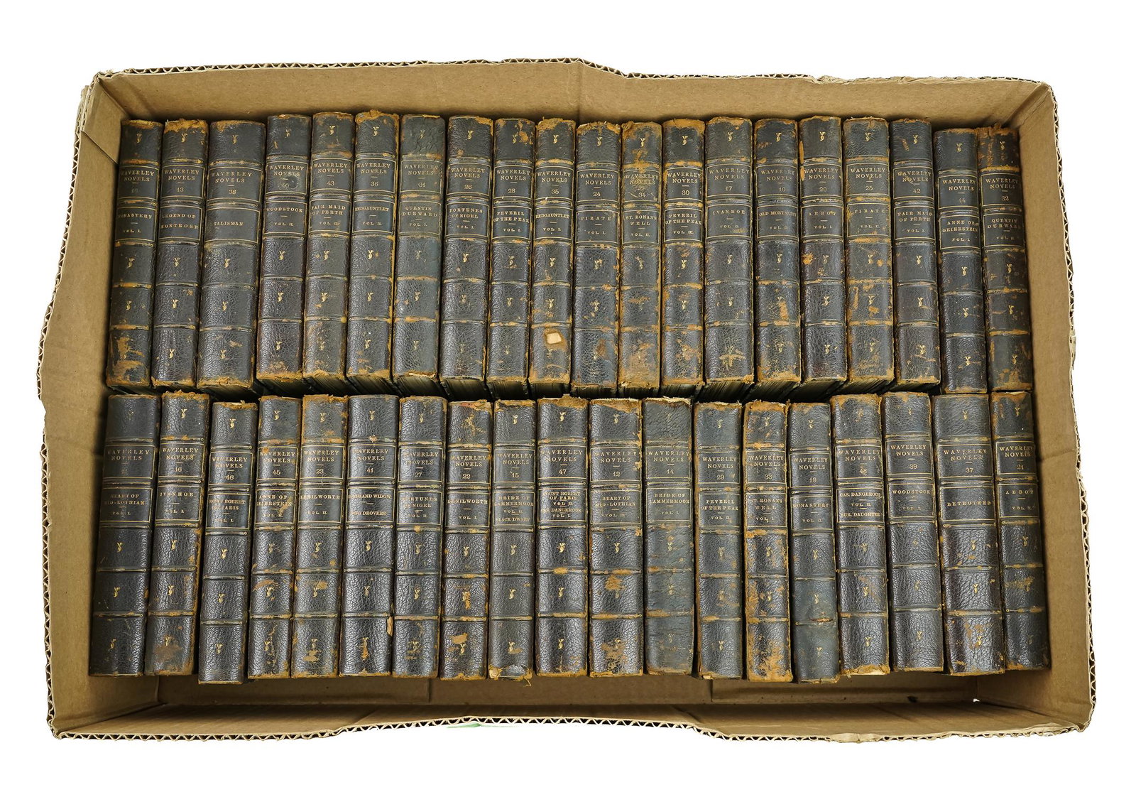 39 Vols. The Waverley Novels in Leather Bindings: 39 vols. "The Waverley Novels" printed in 1860 by Adam and Charles Black Edinburgh Scotland, in gilt quarter calf bindings, uncollated, appears to be an incomplete set, some wear and imperfections to 