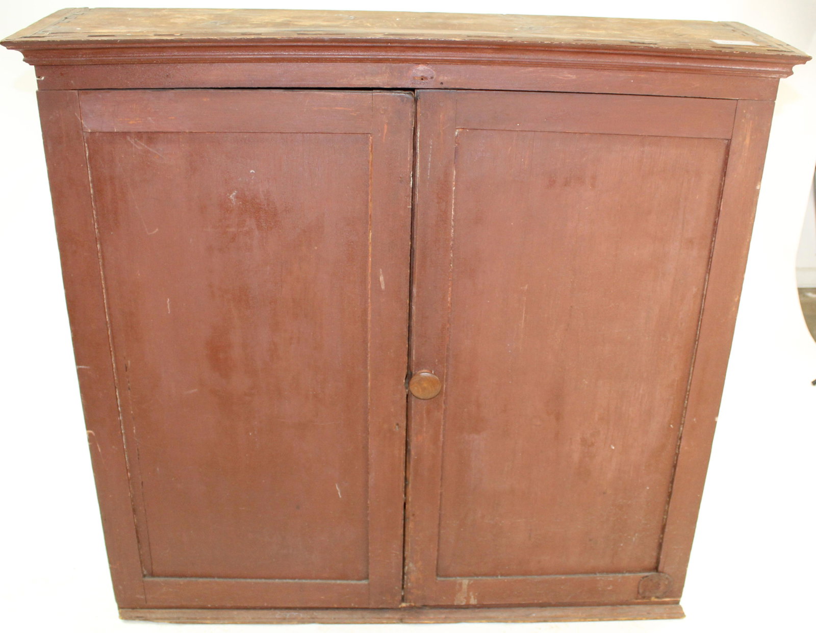 Mid 19th c. Two Door Cupboard or Secretary Top: Early/mid 19th c. pine two door wall cupboard or secretary top in old red paint, pegged door framed with chamfered panels, dovetailed case construction with molded crown, divided interior, old make do