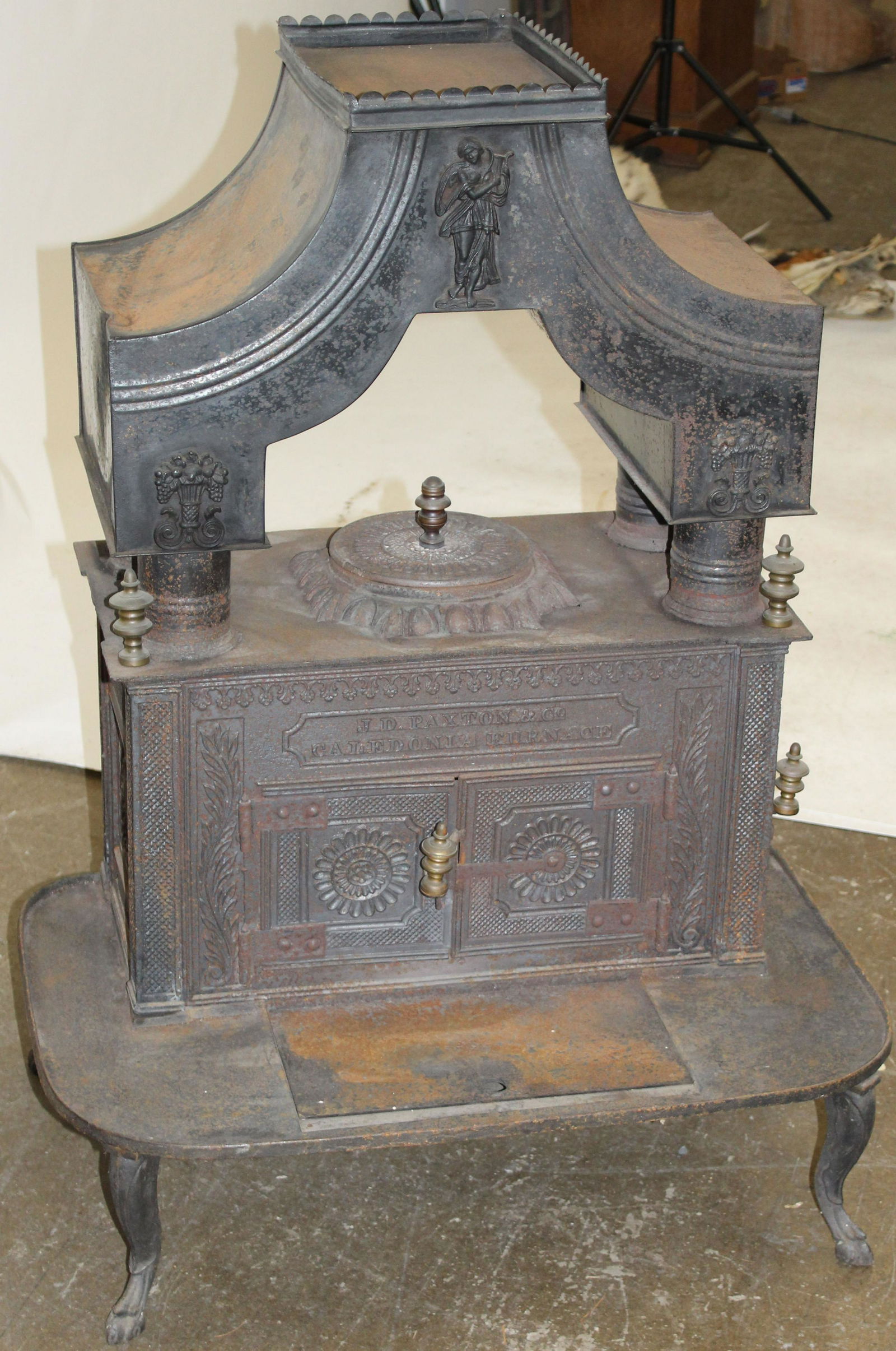 19th c. J.D. Paxton Cast Iron Wood Stove: Rare ca. 1837 J. D. Paxton (and Thaddeus Stevens) "Caledonia Furnace" cast iron and sheet steel wood stove with highly detailed sides, floral cornucopia and female embellishments. James D. Paxton and