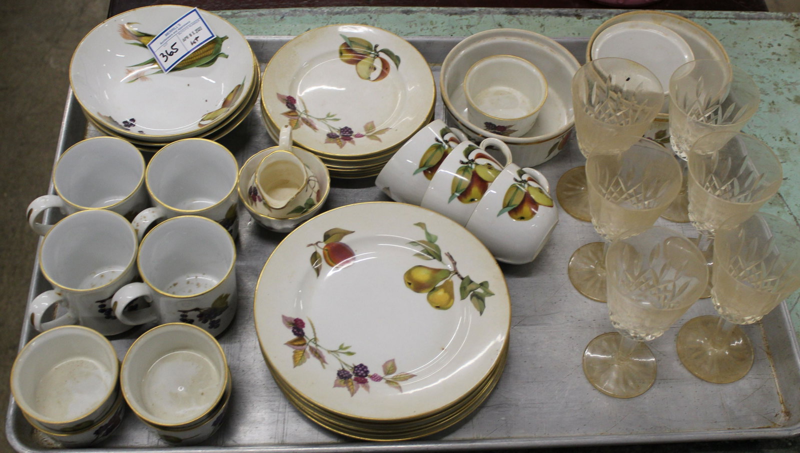 Royal Worcester Evesham and Waterford Lismore: 31 pcs. of Royal Worcester "Evesham Vale" fruit decorated oven proof porcelain dinnerware , accompanied by 6 Waterford "Lismore" pattern Irish crystal wine glasses