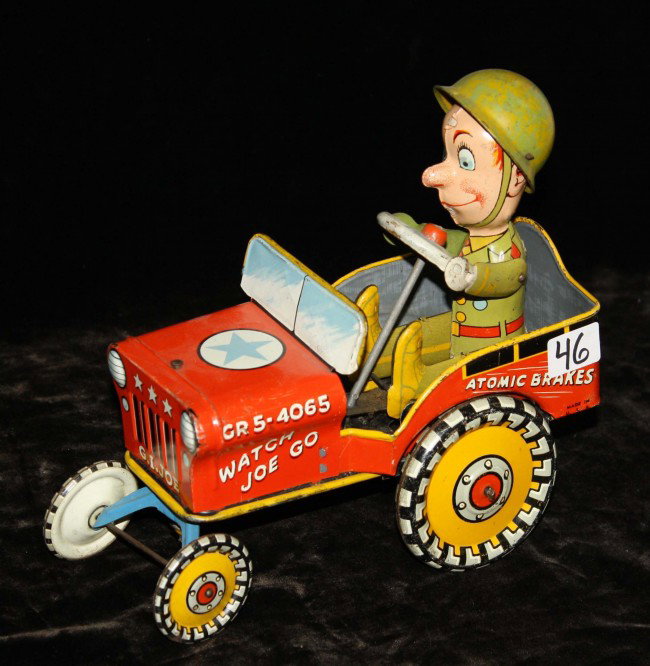 Circa 1960 Unique Art GI Joe Jouncing Jeep tin lith: Circa 1960 Unique Art GI Joe Jouncing Jeep tin litho wind up toy