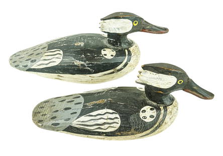 Pair of Small Merganser Decoys: Pair of small unsigned merganser carved wooden duck decoys, working birds with old lead weights, length 11 1/2" each