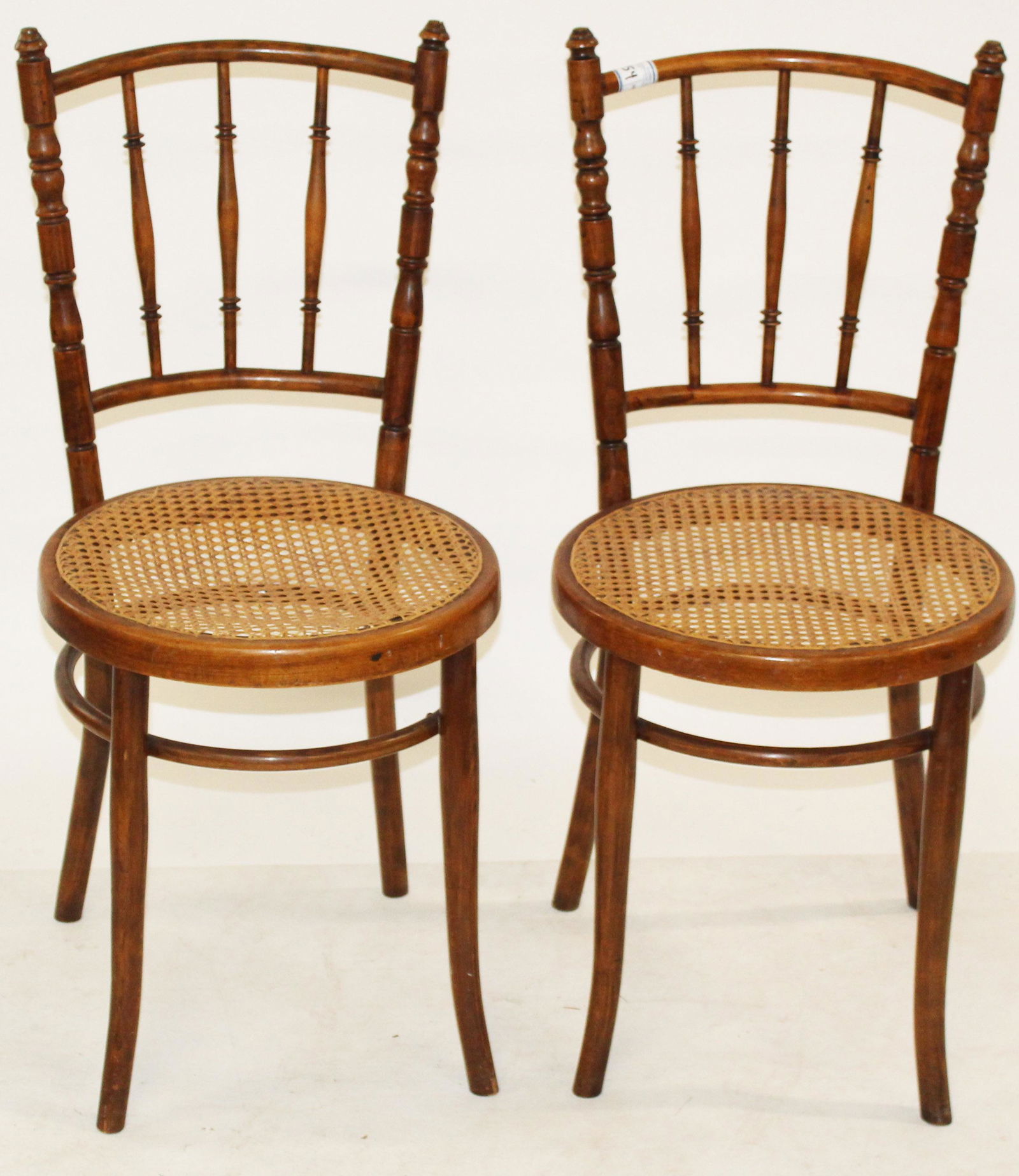 Kohn Austria Pair of Side Chairs: Late 19th attr. J & J Kohn Vienna Austria pair of caned seat side chairs with turned spindle backs 35" x 15" x 16"